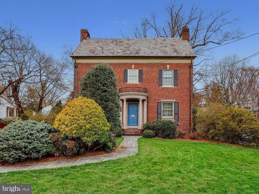 Welcome to this stunning Colonial-style residence located in desirable Woodside Park, where timeless charm meets modern comfort. Nestled on a generous 17,000 square foot lot, this beautifully maintained and improved property boasts impressive and easy living space, perfect for entertaining and creating lasting memories. As you approach, you’ll be captivated by the winding walkway and front portico that enhances the exterior, providing a warm and inviting atmosphere. Stepping inside, you'll discover a harmonious blend of classic elegance and contemporary amenities, featuring rich hardwood and slate flooring, and arched doorways leading you through spacious rooms filled with natural light. With five generously sized bedrooms on the two upper levels, three full bathrooms, plus a half bath on the main, there’s ample space for everyone to enjoy their own sanctuary. The newer added Primary Suite is a dream, with two walk-in closets, cathedral ceiling, windows with two exposures, private balcony for delightful sunsets, and sizable primary bath with frameless glass shower and custom cabinetry. In the highest of the home’s levels is an amazing bonus room for a 5th bedroom, office, playroom - whatever space you need - with a large walk-in closet and eaves storage. (The space has been plumbed for a sink.) On the main level, you'll find the heart of the home with a gracious living room, complete with a wood-burning fireplace that adds character and warmth for cozy evenings, and a generous dining room for more formal dining. The kitchen is a chef’s delight, equipped with modern appliances, an expansive island with Brazilian soapstone, and ample and beautiful cherry cabinetry.  Adjoining the kitchen is an enviable family room, a convenient mud room with driveway access, and a sunroom with brick walls, charming arches, slate flooring, and double French doors opening to an inviting patio. The lower level offers endless possibilities. Along with the recreation room featuring the second wood-burning fireplace and full bath, there is a bonus room, which can be reimagined into a home gym, artist’s studio or additional storage space, a utility room, and additional closet storage. The meticulously landscaped and sweeping rear yard offers a serene retreat, in a park-like setting, surrounded by lush trees and specimen plantings creating a peaceful backdrop for your everyday life. Enjoy evenings under the stars in the hot tub, at a fire pit or on the multiple balconies, or host parties on one of the rear patios; this home was designed for entertaining. Parking is a breeze with a detached garage that accommodates two vehicles at the end of a long, private driveway, providing additional, multiple car parking. This property is not just a house; it’s a place where you can create a lifestyle filled with comfort, joy, and connection. Don’t miss the opportunity to make this enchanting Colonial your forever home, where every detail has been thoughtfully designed for your enjoyment.