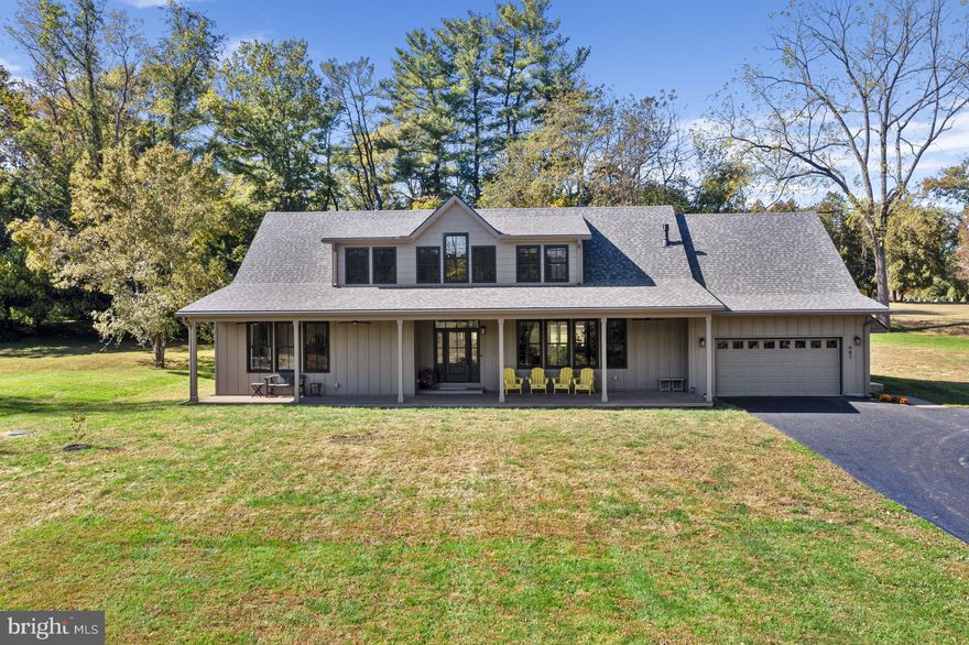 Set on a private 2-acre lot in desirable Birmingham Township and located within the award-winning Unionville-Chadds Ford School District, this exceptional Cape Cod residence offers refined living in a serene setting. The original home was taken down to the foundation and completely rebuilt, blending timeless style with modern luxury and an open, easy-living floor plan. A large covered front porch welcomes you into the foyer, where the expansive open layout immediately impresses. The large windows flood the home with an abundance of natural light and usher in the beautiful views.  The custom chef’s kitchen features bespoke cabinetry, high-end appliances, and a generous center island with seating, seamlessly flowing into the spacious family room highlighted by a slate gas fireplace—ideal for both everyday living and entertaining. The main level is anchored by a luxurious primary suite, offering a spacious bedroom, a modern spa-inspired bath with a large walk-in shower and dual-sink vanity, and separate his-and-hers walk-in closets. A mudroom with laundry and informal powder room provides access to the attached two-car garage, while a private office and formal powder room complete the first floor. Upstairs, French doors lead to a comfortable living area, three well-appointed bedrooms, and a full guest bath. One bedroom includes a large semi-finished attic space, offering excellent storage or future expansion potential. The unfinished walk-out lower level provides abundant additional storage. Outdoor living is equally inviting, with a rear patio overlooking the surrounding natural landscape and stunning vista views. The property is further enhanced by two detached garages—one two-car and one one-car—ideal for additional vehicles, hobbies, or storage. Additional features include engineered wood siding (LP SmartSide siding), spray foam insulation, Marvin Elevate Windows, all PEX plumbing and top-of-the-line appliances. This private oasis offers peaceful seclusion while remaining conveniently close to Route 202, West Chester, Wilmington, and all the amenities the area has to offer.