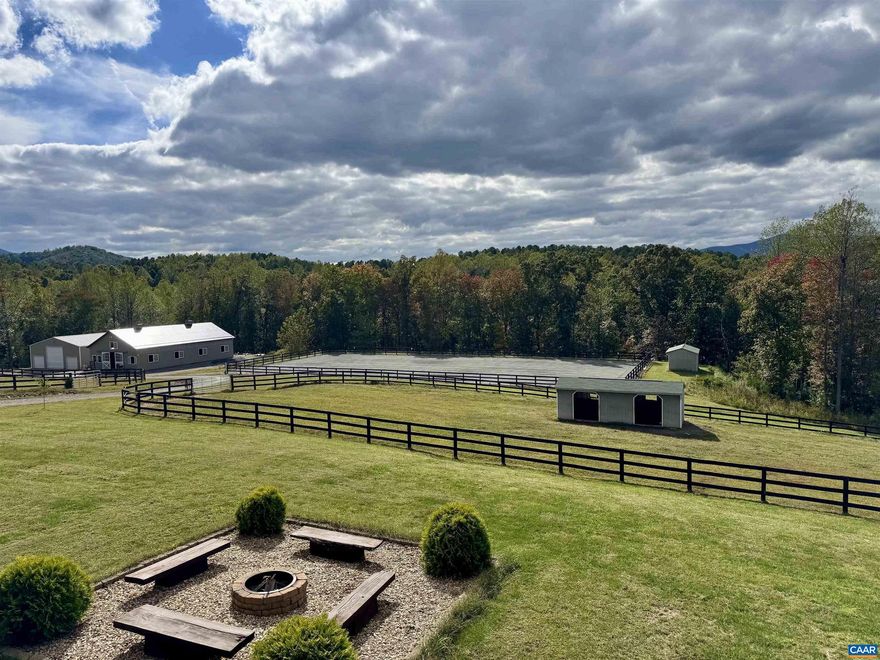 Whistling Ridge Farm - Discover this exquisite equestrian estate, offered for the first time, on nearly 80 private acres just outside Charlottesville. Nestled amidst mature hardwoods, this property boasts a custom mountain home with breathtaking 270-degree mountain views and a stunning, custom-designed horse facility including a 100x200? riding arena and a total of 10 stalls (6 12x18? foaling, 4 12x12?), 2 wash areas, 2 tack rooms, and a feed room with laundry. Enjoy expansive, well-maintained pastures with spacious run-ins and geothermal waterers. The land features a year-round stream, fruit tree orchard, and trails for riding, hiking, or ATV exploration, teeming with wildlife. A 42x48? storage barn holds 100s of hay bales, class A rv (with 50-amp hookup), with room for all your equipment. The home, accented with red oak timbers, offers a modern open-concept design, a Tulikivi soapstone fireplace, and energy-efficient features like spray foam insulation and two-zone HVAC. The chef?s kitchen dazzles with a 60? Viking double oven range and a large walk-in pantry. Additional amenities include a 2-car garage, indoor/outdoor dog kennels, and a covered patio with outdoor kitchen and fire pit. Move-in ready for you and your animals!,Quartz Counter,Wood Cabinets,Fireplace in Great Room