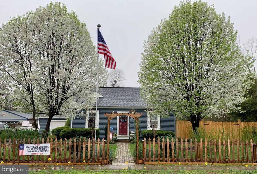 Welcome home to this 2 bed, 1 bath Rambler on almost a half acre of land in Gorveton Heights! Beautifully landscaped with two majestic flowering trees flanking the brick walkway that leads to your front door. Walk into the light and bright living room that features hardwood floors, ceiling fan, and a built in electric fireplace with stone exterior and wooden mantel. The spacious eat in kitchen features tile flooring, plenty of counter and cabinet space, tile backsplash, and sink with detachable faucet and window view. Also features stainless steel appliances, including a double door fridge with ice maker. Convenient combined laundry and mudroom, with additional exit/entrance, for easy grocery drop off. The two bedrooms are light and airy and include double door closets. The hall bath feels more like a spa with marble tile and jetted tub. Sitting on almost half an acre you will love spending time out in the landscaped yard with new brick patio, the perfect place to entertain. Long paved driveway and detached automatic garage provides plenty of parking for you and your guests! Additional updates include New Roof, New Siding and an extra layer of insulation inside! Easy access to commuter routes, metro, shopping and dining. You do not want to miss this one!