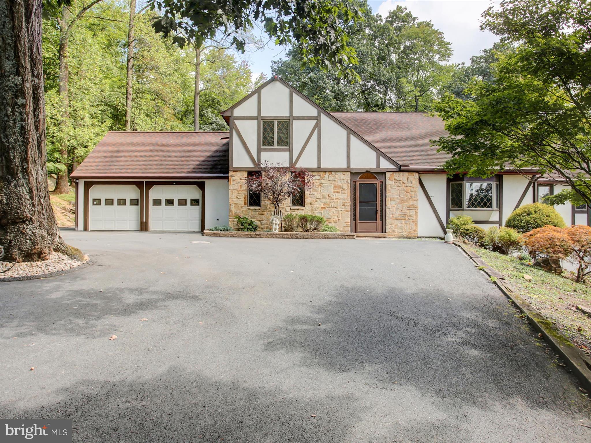 This beautiful home offers 4 bedrooms and 4.5 bathrooms, set on over 6 private acres in the sought after Cumberland Valley School District. The property features first floor primary bedroom, multiple garages , inground pool, and a serene setting surrounded by nature. While the home could benefit from some updates, it presents an excellent opportunity to customize and create your ideal retreat. Enjoy privacy, space, and endless potential at this prime location.