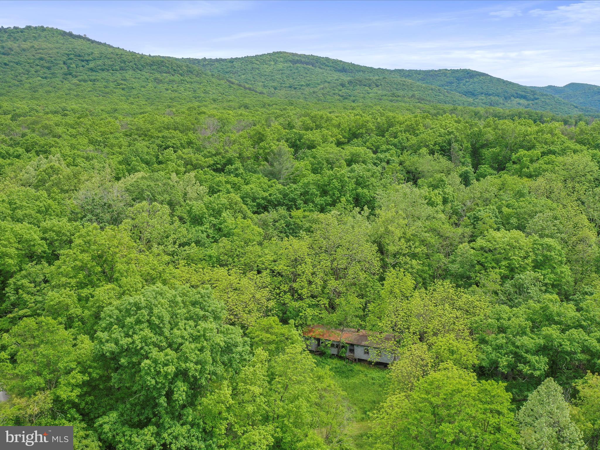 NONE UNRESTRICTED - Land