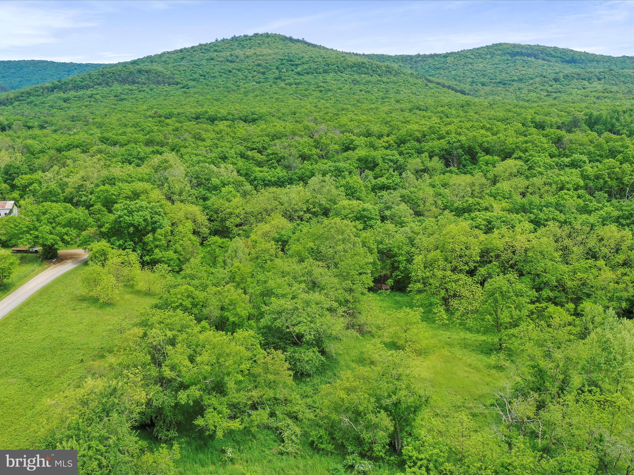 NONE UNRESTRICTED - Land