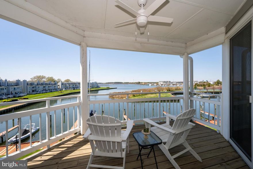 Prepare to be captivated by breathtaking sunsets and stunning water views that this third-floor condo has to offer. Enjoy the ease of single-level living with three spacious bedrooms and three bathrooms, all complimented by magnificent water views and sunsets. With 1,700 square feet of thoughtfully designed living space, this lovely home boasts floor-to-ceiling windows that fill the living areas with natural light and picturesque water views.

The centrally located kitchen features beautiful cabinetry, sleek granite countertops, and a seamless connection to the dining area, where large sliding doors open up to the larger waterside deck.  Yes, there are two waterside decks here! This condo also includes two primary bedrooms. One of them, enhanced with French doors and built-in shelving, is currently utilized as a library/office but could  revert back to a primary suite. It even has its own private sliders leading to the second waterside deck.

With an exceptional floor plan and outstanding views, this home truly shines. Nestled within the private gated community of Oyster Cove, you'll love this resort lifestyle. The amenities include a saltwater pool, tennis and pickleball courts, picnic areas, a dog park, an exercise room, a party room, and marinas (separate fee). For those who enjoy the outdoors, the walking and jogging paths weave throughout the community and link to the 6.5-mile Cross Island Trail. Plus, you're conveniently close to the Bay Bridge for commuting, shopping, dining, and more.