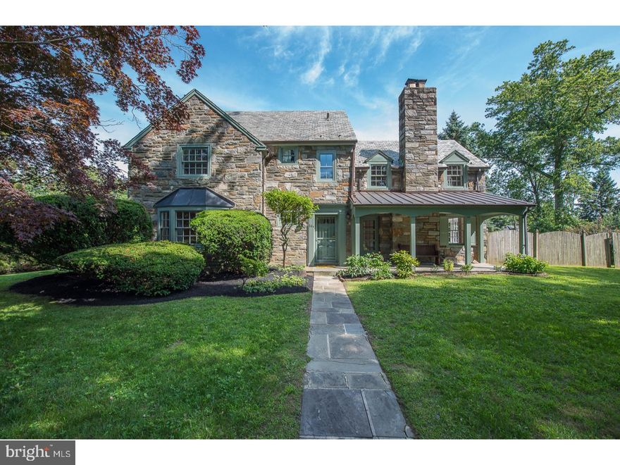 Not Just a Place to Live but a Place to call Home!  This home is a Solid Stone Colonial with a Slate Roof.  The Property  has great presence and sits on almost a half-acre lot. The grounds are level and totally  fenced-in for  privacy.  Enter through the front door into a beautiful Center Hall that leads to a Large Living/Great Room with Fireplace, Generous formal Dining Room, Powder Room, Den and Updated Kitchen that opens  to an inviting Sun Room/Jacuzzi Room which leads  to the lovely, private brick patio and Back Yard.  The second level has a large Main Bedroom Suite with its own full Bathroom and Walk-in Closet.  3 other good sized bedrooms and 2 bathrooms. The third level has a 5th  Bedroom and Bath perfect for an Au Pair Suite or In-Law Suite.  The Lower Level features a large  Family/Game room with fireplace, Powder Room and Utility/Laundry Center.   This property has an over-sized private driveway off of Montgomery Ave that at times has accommodated up to 12 cars.  Easy walking distance to Houses of Worship and Public Transportation right outside your door.  Main Line living at its BEST!! Owner is a Lic. Real Estate Agent.