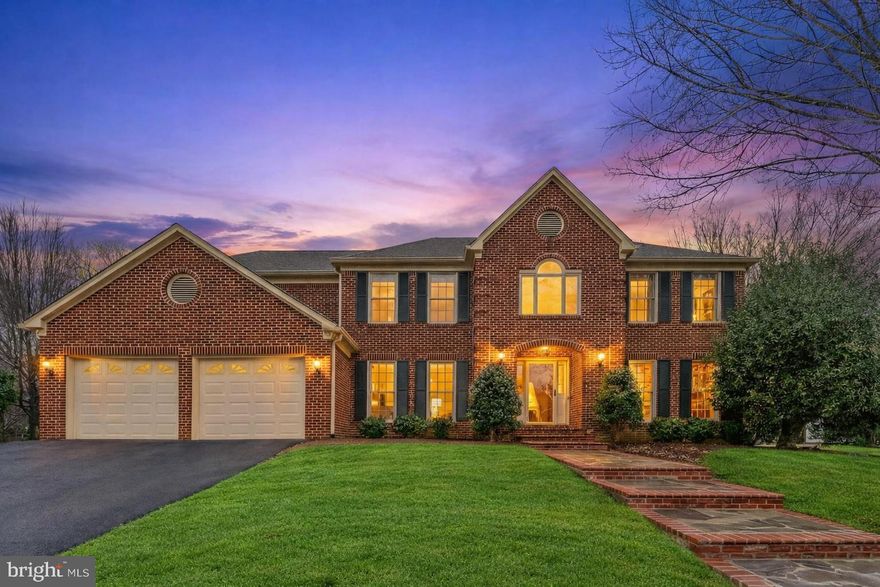 Open Sunday, March 15th, from 1-3 PM! Exquisite craftsmanship defines this stunning residence nestled in the highly sought-after Westport community of Virginia Run. This home has 4 bedrooms, 3.5 bathrooms, and 5,026 finished square feet, blending timeless elegance with modern comfort in a bright, open floor plan. A welcoming two-story foyer sets the tone, opening gracefully to formal living and dining rooms adorned with refined architectural details, including chair railing, crown molding, and recessed lighting. At the heart of the home, the chef’s kitchen is truly a showpiece. An oversized center island with seating anchors the space, complemented by top-of-the-line stainless steel appliances, dual ovens, a six-burner stove, and a statement range hood. The kitchen flows seamlessly into the breakfast room with direct access to the expansive deck, perfect for effortless indoor/outdoor living. The soaring two-story family room, highlighted by a fireplace, creates a dramatic yet inviting setting for gatherings. Just beyond, the sunroom bathes the home in natural light and provides an ideal space for relaxing or hosting a friendly game of pool. A thoughtfully designed bar area connects the family room and sunroom, complete with custom cabinetry, drink refrigerators, a sink, and space for a table. The main level also includes a distinguished executive office with built-in bookcases and a convenient half bath. On the upper level is a luxurious owner’s suite that offers a spa-inspired bath with a soaking tub, frameless glass shower with dual shower heads, dual vanities, a heated tile floor, and a spacious closet. Three additional generously sized bedrooms and a beautifully appointed hall bath with a walk-in shower and built-in bench complete the upper level. The finished lower level expands the living space even further, showcasing a large recreation room with recessed lighting and tray ceilings, a home gym, a full bathroom, and an exceptional wine cellar ready to house your favorite vintages. Set on a private 0.32-acre lot, the beautifully maintained backyard offers tree-lined views and year-round tranquility. A full span deck stretches across the rear of the home, providing the perfect setting for summer barbecues, morning coffee, or hosting gatherings with family and friends. A two car front loading garage and spacious driveway ensure ample parking. Residents enjoy the outstanding amenities of Virginia Run, along with convenient access to community paths, pool, nearby shopping, dining, and Virginia Run/Stone/Westfield pyramid.