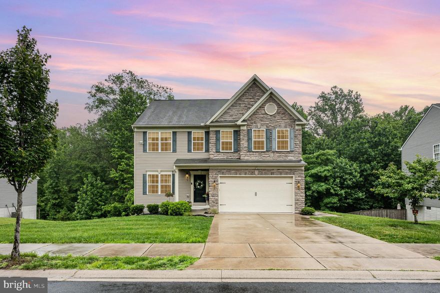 What a tremendous opportunity to own this well kept, move-in ready home, just 9 years young.  This was the builder's original model home which includes many upgrades throughout.  As you enter through the front door foyer, you will immediately notice what could be your sitting room or formal living room.  As you continue to walk through, you will be impressed with the spacious open layout of the main level floor plan, which offers a generous size family-room, dining area, and large gourmet Kitchen with island.  Rejoice with the extra square footage making this home's design larger than its neighbors. Upstairs you will find four generous size bedrooms to include an expansive master suite with master bathroom and large walk-in closet. Upper level large laundry room makes for easy access and convenience.  The fully finished lower level rec room was rarely used by the current owners! Plenty of xxtra storage as well in the utility room which has a rough-in for future basement bathroom.  Don't forget the extra-wide two car garage with room additional storage.