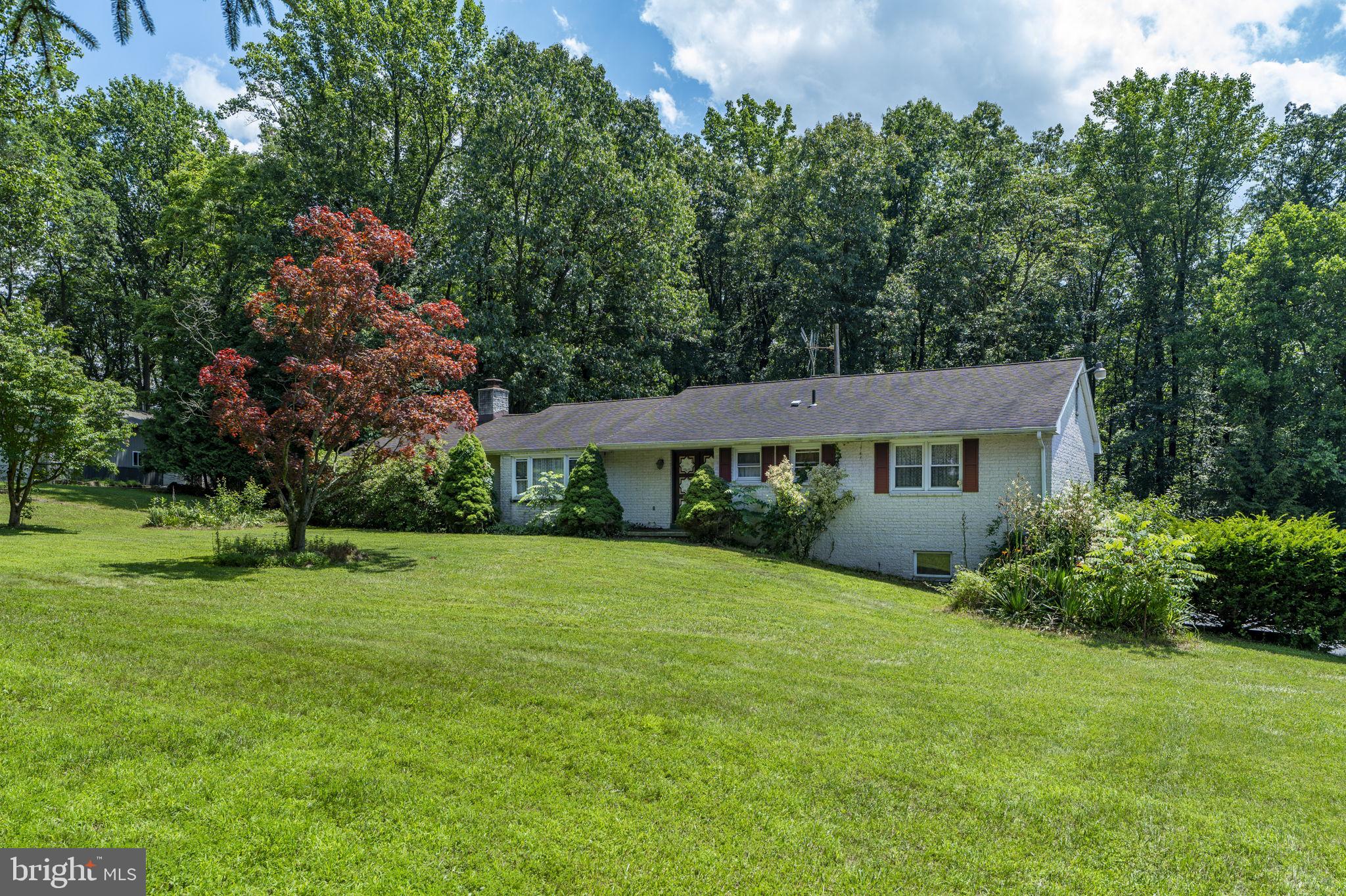 AUCTION DATE - WEDNESDAY, AUGUST 27, AT 4 PM. LISTED PRICE IS AN OPENING BID ONLY AND IS NOT INDICATIVE OF THE FINAL SALE PRICE. REAL ESTATE: 1 sty. Holland stone one owner ranch style dwl. w/2012 SF finished area, eat-in kitchen w/raised panel cabinets, pantry & appliances, dining, living & family rms., 3 bdrms. (primary bdrm. w/primary bath), 3 full baths, 1st floor laundry/mudroom, attic, daylight bsmt. w/partially finished rec. rm. & utility rm., oil HW heat, central AC, insulated windows, built-in 2 car garage all on 1.8 ACRE partially wooded lot w/country setting, on-site well & septic. NOTE: Spacious one-owner house in need of TLC & your choice of upgrades. Convenient location, minutes to Plowville & Morgantown w/easy access to Rts. 10, 568 & Turnpike. Terms 10% down, balance 60 days or before. Personal Inspection by appointment or open house Sat., August 16 & 23 from 1 to 4 PM.