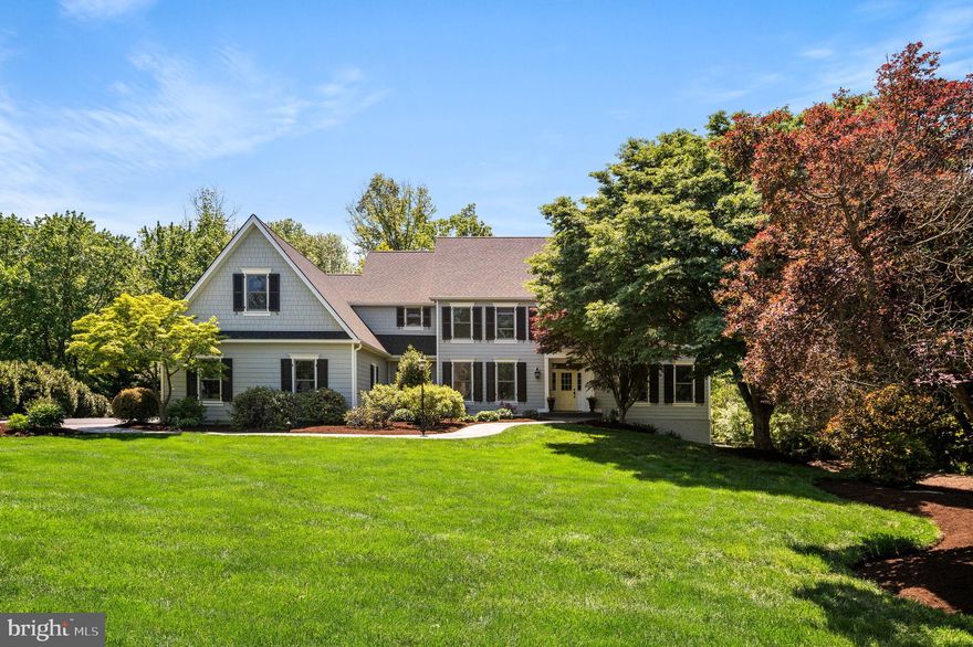 Welcome to 3 Greenstone Way in Malvern, a beautifully maintained and thoughtfully updated 5-bedroom, 4.5-bath Colonial with a classic James Hardie Plank exterior (2021), set on a serene 1.2-acre cul-de-sac lot in Willistown Township, just under two miles from the towns of Malvern and Paoli. A welcoming two-story Foyer with refinished hardwood floors and a sweeping turned staircase introduces the home’s timeless elegance. The main level features a refined Living Room with front-to-back exposure and gas fireplace, a gracious Dining Room with wainscoting and elegant lighting ideal for entertaining, and a custom Office with built-in cabinetry creating a quiet and functional workspace.
The Eat-In Kitchen blends style and functionality with refinished hardwood floors, wood and glass-front cabinetry, a center island with quartz countertops, double ovens, and new appliances (2025). The Kitchen flows seamlessly into the Family Room, highlighted by a stone wood-burning fireplace, cathedral ceiling, custom built-ins, and expansive windows overlooking the backyard. A bright Three Seasons Sunroom extends the living space and opens to an oversized deck and pool, perfect for indoor-outdoor living. Completing the main level are a conveniently located Powder Room, a large Mudroom with garage access, and a sun-filled first-floor Laundry Room.
Upstairs, the spacious Primary Suite offers abundant natural light, a tray ceiling, private sitting room, outfitted walk-in closet, and a beautifully updated Primary Bathroom with new quartz countertops (2026), soaking tub, and walk-in tiled shower. Additional bedrooms include one with an ensuite Bath, two with backyard views, and a well-appointed Hall Bath. The walk-out Lower Level provides excellent flexibility with a light-filled Family Room, a Fifth Bedroom, Full Bath, and additional space ideal for homework, crafting, or hobbies, plus generous unfinished storage with future finishing potential. Outside, enjoy exceptional privacy and outdoor living with a fenced backyard, expansive deck, pool, and room to play, including space for a trampoline, wooden play tower, and a charming chicken coop. Ideally located in the award-winning Great Valley School District and close to top private schools, this home offers a rare blend of space, comfort, and convenience.
UPDATES: New Heat/AC in zone 1 (2023), New Roof (2021), New James Hardie Plank exterior (2021), Generator installed (2013), New Heat/AC in zone 2 (2011)