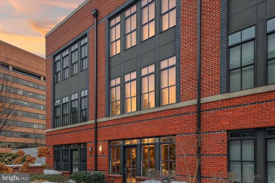 *****Open House cancelled.  Property is under contract.*****  Rarely available and truly exceptional, this four-level townhome in exclusive Printers Row offers a unique opportunity for luxury living in Old Town North. 1 of only 5 fully gated units within the community, this home boasts an expansive main level with a large, open floor plan featuring a spacious kitchen, a convenient half bath, and a bright living area that flows seamlessly onto a generously sized patio—one of 4 outdoor spaces to enjoy! 2 underground, secure assigned parking spaces convey!

The second level is a private retreat, showcasing an elegant owner's suite with a private balcony, a spa-like bathroom, and ample closet space. Upstairs, two spacious bedrooms and a full bath provide comfort and flexibility. The top-level loft offers a large, versatile space perfect for a home office, gym, entertainment room, or any purpose you envision. Step outside from the loft onto a well-sized terrace, then ascend the spiral staircase to the pinnacle of this home—a spectacular roof deck with views of the Potomac River and the iconic George Washington Masonic Temple.

Printers Row is unmatched in location! Just steps from the Mount Vernon Trail, a 7-minute drive to Washington National Airport, and only two traffic lights from DC, this home offers unparalleled access. Walk to everything  Old Town North has to offer, including Trader Joe's, Harris Teeter, Jula's on the Potomac,  Oak Steakhouse, St. Elmo’s Coffee, Sisters Thai, MacMillan Spirit House, and Hank’s Oyster Bar just to name a few. King Street and the waterfront are also a short stroll away!   The inclusive condo fee  covers water, sewer, garage elevator,  bike room, trash and snow removal, building insurance, and all external building maintenance, including landscaping.  A few additions/upgrades include fresh paint throughout, brand new refrigerator, dishwasher, washing machine (2024), and additional storage room added on the main level.


This is Old Town luxury living at its finest—don’t miss this rare opportunity!