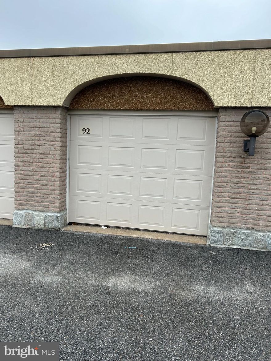 This enclosed garage offers a convenient and secure space for vehicle storage, seasonal items, or personal belongings—perfect for residents looking to add extra utility and value to their property.