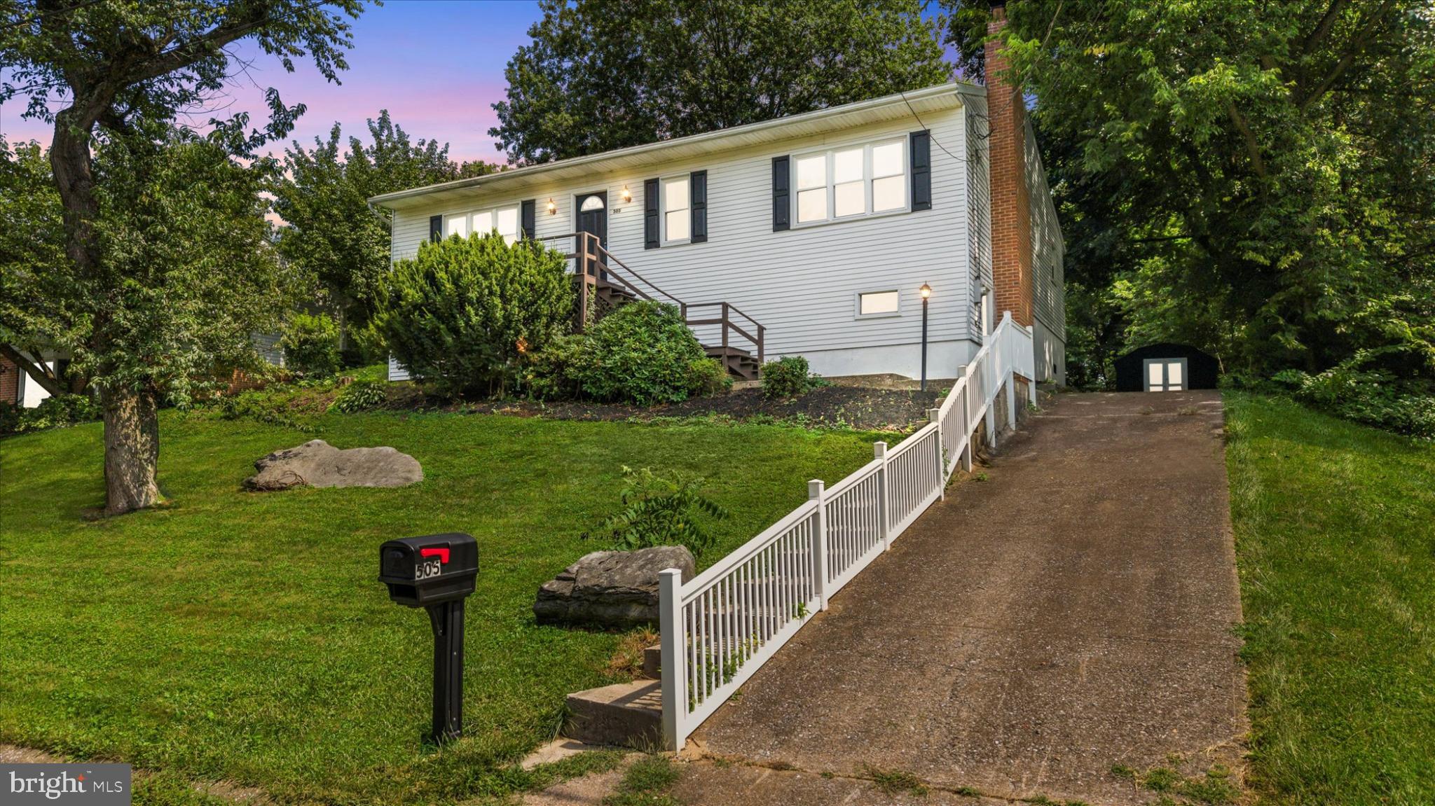 Nestled in the charming Millers Crest neighborhood, this beautifully renovated ranch offers a perfect blend of modern comfort and classic charm. With a thoughtful renovation completed in 2021, this home is designed to meet the needs of today's discerning buyers, providing a warm and inviting atmosphere that feels just right. Step inside to discover an open floor plan that seamlessly connects the living spaces, making it ideal for both entertaining and everyday living. The spacious family room, adorned with a cozy wood-burning fireplace, invites you to unwind and create lasting memories. Natural light pours in through the windows, enhancing the warmth of the luxury vinyl plank flooring that flows throughout the main level. The heart of the home is the well-appointed kitchen, featuring an island that serves as a perfect gathering spot. Equipped with modern appliances, including a built-in microwave, electric oven/range, and refrigerator, this kitchen is both functional and stylish. This home boasts four generously sized bedrooms, providing ample space for relaxation and personalization. The primary suite includes a private bath. Additional features such as recessed lighting and ceiling fans enhance the comfort and ambiance throughout the home. Convenience is key with a main floor laundry area, making chores a breeze. Step outside to enjoy the expansive deck and patio, perfect for summer barbecues or quiet evenings under the stars. The large yard offers plenty of space for outdoor activities, gardening, or simply enjoying the fresh air. With a concrete driveway accommodating up to four vehicles, parking is never a concern. This property is not just a house; it's a place to call home. With its blend of modern updates and classic features, it's ready for you to create your own story. Don't miss the chance to make this inviting space your own!