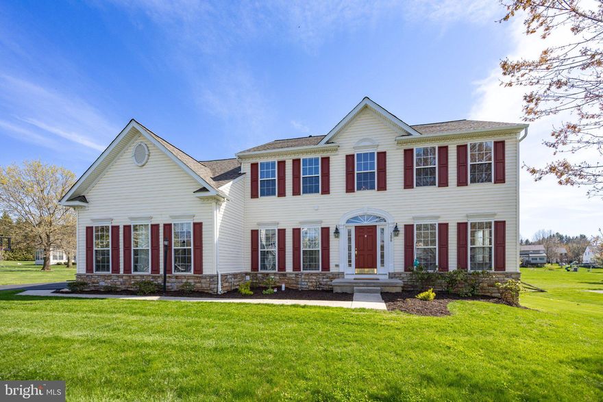 Welcome to 306 Winchester Lane in the desirable Estates at London Brook, located in the Avon Grove School District. This home offers attractive curb appeal with stone accents and a spacious, well-designed layout. Enter through the front door with its sidelights into a bright two-story foyer, flanked by a living room and a private office with French doors. Hardwood flooring runs throughout most of the main level. The center hall leads to a well-appointed kitchen featuring abundant cabinetry, gas cooking, a large pantry, and a center island with seating and glass-front display cabinets. The kitchen opens to the family room, highlighted by large windows, a gas fireplace, and a 4-foot extension for added living space. The adjoining breakfast room is filled with natural light and provides access to the deck—ideal for outdoor dining or entertaining. The main level also includes a powder room and a laundry/mudroom with access to the side-entry two-car garage. Upstairs, a wide hallway leads to the primary suite through double doors, offering a spacious bedroom, two large walk-in closets, and a bathroom with dual sinks, soaking tub, separate shower, and private water closet.  You can find many uses for the sitting room off the main bedroom: exercise, a home office, a sitting room, nursery, or crafts/sewing. Three additional bedrooms and a hall bath with double vanity complete the second floor. The finished lower level provides flexible living space, a powder room, and ample storage. It is enlarged because of the upstairs breakfast room and 4’ family room extension. Additional features include dual-zone HVAC, 9-foot ceilings, a NEW roof (2026), and one NEW HVAC unit (2025). Please view the Video Tour and schedule a showing to see your next home!