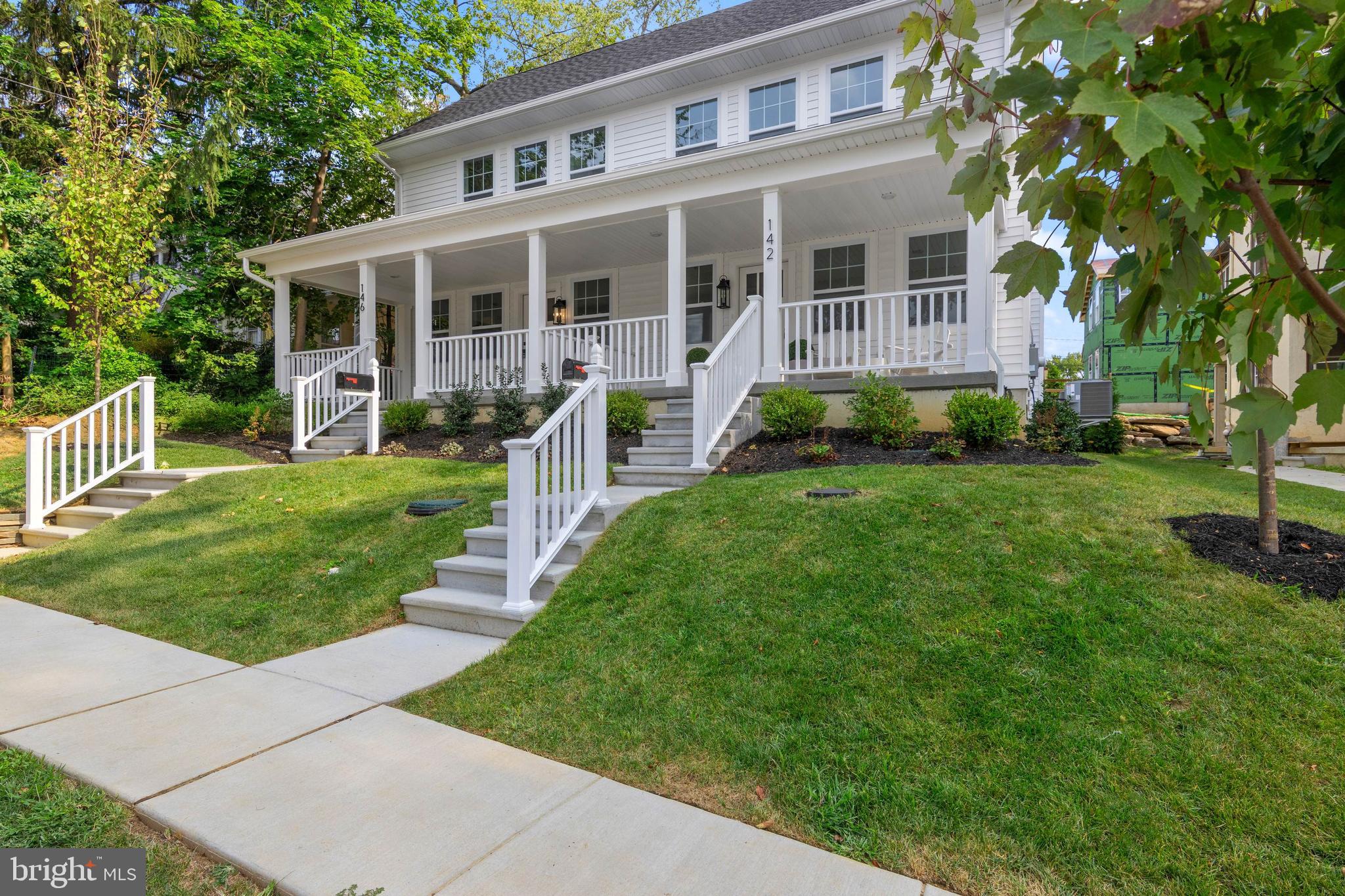 Newly Built in Narberth Borough – All New, Walkable, Move-In Ready
142 Merion Avenue presents a rare opportunity to own brand-new construction in the heart of Narberth, crafted by Craft Custom Homes as part of a thoughtfully planned five-residence project. This property has been reimagined to include two striking twins, two single cottages (one already sold), and the original home, relocated on the parcel and currently undergoing full renovation. Backed by more than 20 years of experience, Craft’s multigenerational team is known for delivering exceptional quality and design from concept to completion.
Set on a quiet, tree-lined, walkable street with sidewalks, the neighborhood is vibrant, with many homes undergoing stylish renovations and improvements. Merion Ave’s curb appeal is undeniable, with landscaped grounds, crisp white siding, and a welcoming covered front porch—perfect for morning coffee or simply enjoying the activity of the block.
Offering 3,440 finished square feet across four levels (2,521 sq. ft. above grade + 919 sq. ft. lower level), with 4 bedrooms, 3 full baths, and 2 half baths. The interiors are entirely new, showcasing light oak hardwood flooring, sophisticated fixtures, and a bright, thoughtfully designed floor plan that blends modern comfort with timeless style.
The main level is designed for both entertaining and everyday living. From the covered front porch entry, light white oak hardwood floors flow through the expansive family room, the dining room with a triple window, and the sunlit gourmet kitchen. The kitchen features white and light wood cabinetry, a quartz center island with seating for four, tile backsplash, and premium stainless-steel appliances from Kieffers, including a GE 30” Smart Range, wall-mounted hood, and 24” dishwasher. A nearby walk-in pantry and stylish powder room add convenience, while a door off the kitchen opens to the rear patio—ideal for grilling or dining outside. Beautiful, modern light fixtures throughout the home provide a refined finishing touch to this level.
The second floor features a primary suite highlighted by a large bay window and two generous closets, including a walk-in. The luxurious en-suite bath offers a double sink vanity, wide-format tile flooring, a spacious glass-enclosed shower with striking tile work, and a separate water closet. Bedroom 2 is also on this level and includes its own stylish full bath with shower/tub and walk-in closet. A conveniently placed laundry room , along with a large hall closet, adds everyday function.
The third floor includes two additional bedrooms, one featuring a charming window seat, along with a full hall bath with tub/shower. The third level also offers a large open room with windows and a desk area—an ideal setting for a home office or study nook.
The finished lower level adds incredible versatility, featuring a spacious bonus room, a powder room, and plenty of room for media, play, fitness, or hobbies.
Lifestyle and location are second to none. Just 0.3 miles from the Narberth train station, residents enjoy direct service into Center City. Whole Foods, the beloved Narberth Theater, cafés, boutiques, and everyday conveniences are all within walking distance. Nearby communities—including Bala Cynwyd, Ardmore, Merion, and Bryn Mawr—offer premier dining, shopping, and cultural amenities. Parks such as Merion Botanical Park, Sabine Park, and Narberth Playground provide green space and recreation, while local traditions like the July 4th fireworks and the seasonal farmers’ market foster a true small-town feel.
Situated in the award-winning Lower Merion School District, these homes deliver the rare combination of new construction, refined finishes, and a highly walkable location in one of the Main Line’s most desirable boroughs.