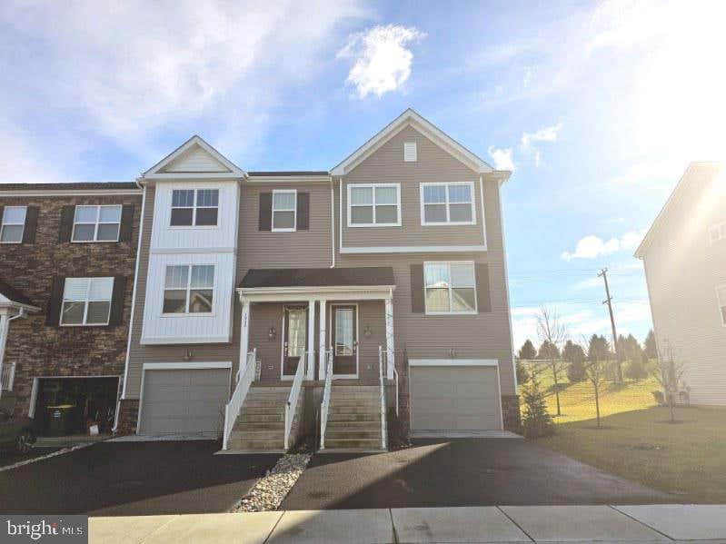 Luxurious and spacious end unit townhouse is availble for rent from January 2024 in the desirable TOWNES AT SHANNON HILL community . This home has lots of upgrades and improvements, hardwood floors, window blinds, Water Softener, Ceiling fans fitted in every room including Living room, 42" gourmet kitchen cabinets, soft close cabinets and much more. Enter through the main door in a two-story engineered hardwood foyer with coat closet and a powder room. As you head upstairs to main level you are welcomed with upgraded engineered hardwood floor and 9ft ceiling open concept expensive family room, dining room and kitchen. This Unit offers East facing with plenty of sunlight in every floor. Kitchen offers breakfast area leading to the beautiful deck with Privacy backyard has amazing view. Upper floor has all bedrooms and laundry is conveniently located on this floor. Primary bedroom offers tray ceiling with recessed lights and as two his/her walking closets. Primary bath is well equipped with double sinks and a seat-in shower. On the lower level behind the large 1.5 car garage is the great room with engineered hardwood flooring for recreation offering walk out to the back yard, Driveway and Extra guest parking space opposite of the home is a plus. Near to shopping center, corporate offices and close to Rt 30 and Rt 322. conveniently situated between Downingtown and West Chester, Minutes away from Thorndale/Paoli Train station with direct trains Philadelphia downtown and Downingtown school district is a great plus, Near by to all malls, groceries, pharmacy. Walkable distance to United sports soccer fields.