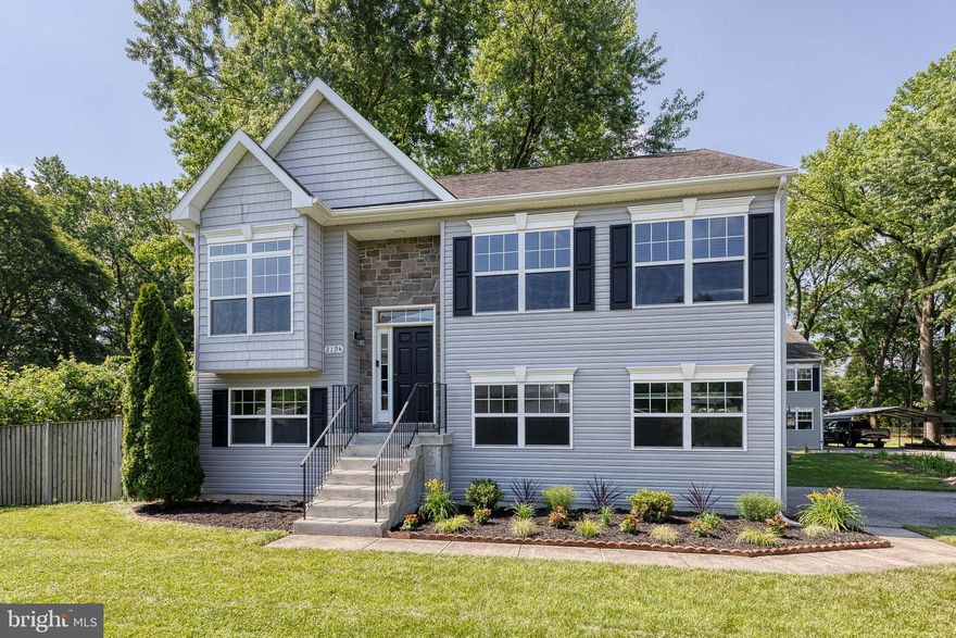 Welcome to 219-A Margate Road in Glen Burnie, a beautifully updated 3-bedroom, 2.5-bath split-foyer home in the highly desirable Margate community. Built in 2015 and offering nearly 2,000 square feet of finished living space, this home has been thoughtfully enhanced with brand-new flooring throughout, fresh paint, a new glass tile backsplash, and a new water heater. The bright, open-concept main level features spacious living and dining areas, a modern kitchen with granite countertops and stainless steel appliances. Upstairs, you’ll find a private primary suite with en-suite bath, plus two additional bedrooms and a full hallway bath. The fully finished lower level includes a large recreation room, laundry area, storage space, and a convenient half bath—perfect for guests or extended living use. Step outside to enjoy a private patio and fully fenced backyard, ideal for entertaining or relaxing. Additional highlights include an attached two-car garage, extended driveway parking, and an incredible VA assumable loan at just 3.25% interest (subject to VA eligibility and lender approval). Conveniently located near shopping, dining, parks, and major commuter routes like I-97, MD-100, and MD-10, and served by the Anne Arundel County School District, this move-in-ready home is offered at $479,900. Don’t miss this rare opportunity—schedule your tour today!