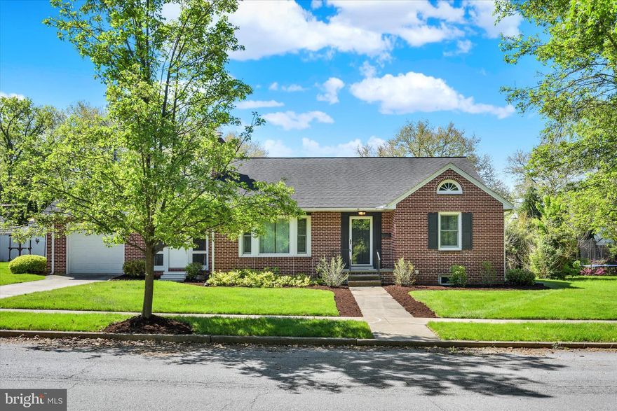Incredible one-floor-living in Hummelstown Borough! This all brick home has been freshly painted and landscaped. Walking through the front door the living room is bright with a large bay window, gleaming hardwood flooring, and a cozy stone fireplace. The kitchen comes equipped with plenty of cabinetry, movable island, and a breakfast nook. Both bedrooms are on the first floor and both have ample closet space. The bathroom is updated (2022) with a tiled walk-in shower and upgraded flooring. The sunroom doubles as a laundry room offering great convenience. Upstairs you'll find a spacious bonus room with the potential to be a 3rd bedroom, office, game room, family room, or play room! Tons of opportunities for storage in the full basement and shed. Head outside to enjoy the lush, level lawn complete with patio and established landscaping. Additional features include newer windows, radon system, and a one-car garage.