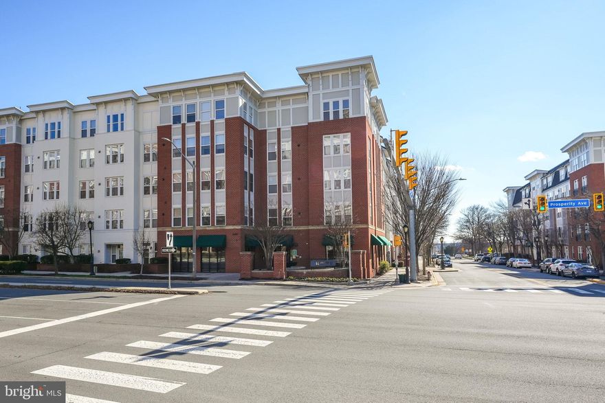 Welcome to The Halstead at the Metro I!  This condominium is located just at the Dunn Loring Metro, near the Mosaic District in Merrifield, with tons of shopping, restaurants, and more. This amenity-rich community has an outdoor pool, a gym (located in this building), basketball courts, a party room, and more.  Unit #307 is a 2 bedroom, 2 full bathroom home that includes 2 parking spaces, and is 1,074 SQ FT.  The roomy island kitchen has granite counters and black appliances.  The washer and dryer are located in the unit in a roomy laundry closet.  Both bedrooms are large with attached en-suite bathrooms.  The Living Room  has a bay window and is open to the kitchen and dining nook.  There is plentiful storage in this home, with large closets in both bedrooms, a coat closet, and a pantry.