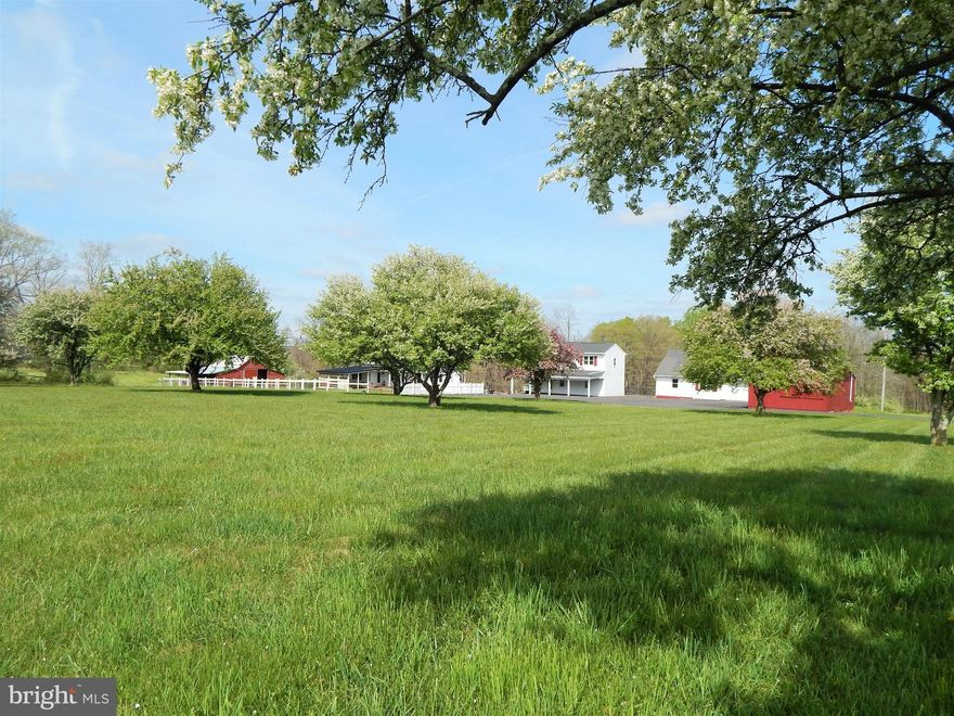 Original Mergenthaler House c. 1859.      Set on 41.45 Acres and set far back from Stump and Schlenz Hill Rds. lies this beautiful, serene, private and pastoral property; the perfect place to live and/or farm!  Nothing to compare it to for this price in the Central Bucks area that is as comprehensive with so many possibilities to offer.  The property consists of a "vintage farmhouse", a separate detached updated and 2bed/2 bath carriage/guest house, detached storage room with two-car garage, inground pool, 6 stall horse barn, and a pond and large red barn most buildings are serviced by a Generac generator.   All structures are routinely cared for and well-maintained for their function and form.  Pure and Simple with the possibility to have a self-sufficient old-fashioned farm. Numerous Wildlife includes deer, turkeys, fox, owl, turtles and fish in the pond, and more; a nature beautiful sanctuary that pleases the eye!
Added features include newly installed 5- foot solar powered electric fenced pastures to suit new owner's purpose to house and keep horses, a tree farm, or vineyard, or enjoy keeping animals etc.  37 Acres are Preserved (document available) in the rear of the property with a 25 acre township Conservancy directly behind this property. The farmhouse and other buildings, including the large red barn and horse barn with 6  stalls sit within a 3-acre building envelope for the buyer either renovate the well-maintained residence and/or expand it.   *The detached guest house serves as a wonderful cottage with a relaxing porch, 2 bedrooms/ 2 bathrooms, a nice kitchen, fireplace, and laundry room.   In addition, there is a detached office space with adjacent two-bay garage.    A very charming, quintessential small farm in a beautiful, 
private setting. Numerous Wildlife includes deer, owl, fox, turkeys, and more!