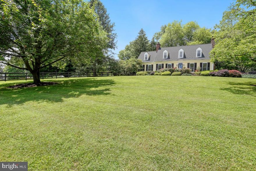 EXCEPTIONAL POTOMAC ESTATE** TAKE A MAGICAL JOURNEY TO THIS ENCHANTING WONDERLAND !**Truly a unique offering & EXPERIENCE!  A nature lovers delight- your own private oasis! Vintage charm meets the modern! Stately, classic  4 bedroom/2.5 bath center hall Williamsburg Colonial beauty, ideally sited atop hill on a spectacular 2.5 acre lot boasting an east/west orientation! Stunning sunrises, dramatic sunsets! Interior spaces flow interchangeably as the fabulous and "traditional" floor plan is perfect for daily family living and equally superb for spirited gatherings & large group entertaining! MAIN LEVEL: Generous main floor living spaces flow with ease making the home feel unified, spacious and grand. Loads of natural light throughout! Elegant living room, GRAND dining and warm, cozy family rooms all w/ wood burning fireplaces, transition beautifully and offer great living space.  High ceilings, crown & chair rail moldings, newly refinished gleaming oak hardwoods, terrazzo and marble tile & updated windows adorne this residence. The glorious Chef's galley kitchen complete w/ high end appliances and finishes include Viking, Thermador and Kitchenaid, granite counters, recessed lighting, butlers bar and  special custom designed millwork cabinets. Three stunning wood burning fireplaces, built-ins, multiple double french doors (many leading to outside spaces) and a breakfast nook.  The gem on the crown is the AMAZING "three season" porch just off the family room! Guaranteed to be a popular gathering place for family & friends! UPPER LEVEL: Exceptionally large private owners suite & full bath w/ tub, loads of closet/storage space. Three additional large bedrooms and second updated full bath. LOWER LEVEL: Fully finished walkout lower level complete w/ dramatic full sized "custom wood crafted" wet bar & Tiffany styled lighting, new berber carpet, recessed lighting , wash room and additional storage.  These are just some of the  exceptional features of this fine and distinctive property. EXTERIOR SPACES: Hardieplank siding w/ dental moldings and architectural engineered cedar shake roofing. The crowning jewel of this fine property is its spectacular outdoor spaces! A long private tree-lined driveway gives you the feeling that "you have arrived"!  Vista views abound from every vantage point within the 2.5 acre lot! The professionally and gloriously landscaped spaces are a gardeners delight! Enchanted Garden! Teaming with a myriad of plantings and pathways, the garden beckons you! Partially treed,  partially fenced with an abundance of open grassland! The  expanded flagstone terrace leads you to a sumptuous inground pool, ideal for relaxing and having fun on those endless summer days! The upper lot boasts a Amish built storage shed and large fire pit area, perfect for gathering on those cool Autumn nights! LOCATION: Close to amenities including schools, shopping,  Potomac Village and I-270. This indeed is a most special offering!