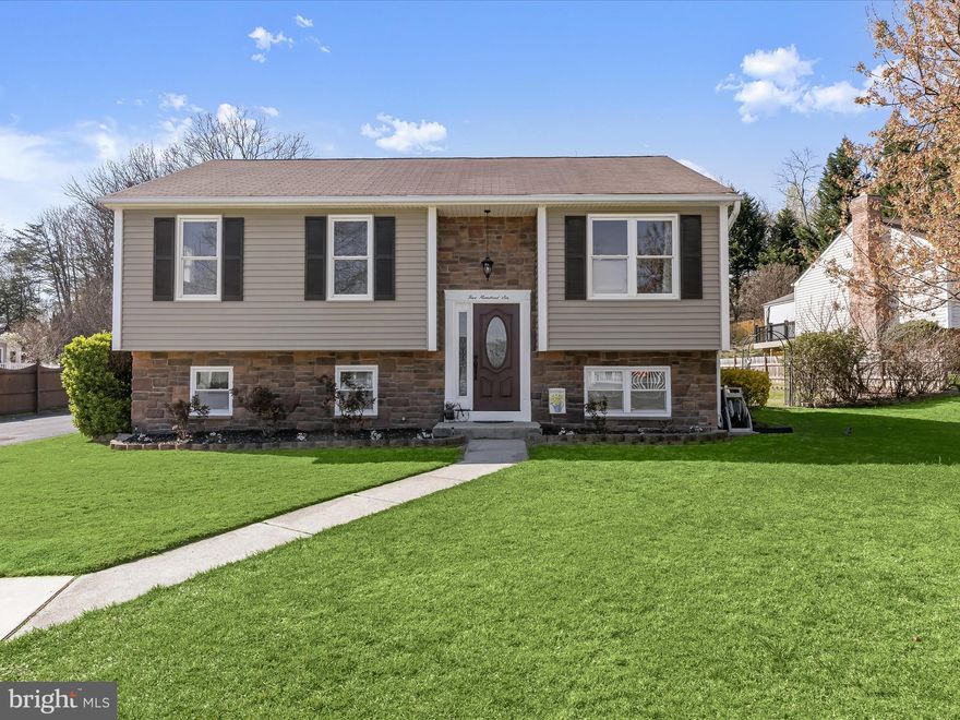 Welcome to this beautifully updated split-foyer home in sought-after Ferndale Farms! Nestled on a cul-de-sac, this stone and siding residence boasts striking curb appeal and thoughtful upgrades. Step inside to a bright, airy living room with a vaulted ceiling and luxurious laminate flooring that seamlessly flows into the open dining area. The kitchen is a delight, complete with Samsung appliances, a decorative backsplash, a peninsula island, electric cooking, and ample counter and storage space, all with easy access to the deck, patio, and lushly landscaped backyard.  Retreat to the serene primary bedroom, offering elegant flooring and double closets. A second bedroom and a stylishly updated hall bath complete the main level. The fully finished lower level provides exceptional additional living space, including a spacious third bedroom with a walk-in closet, a full bath, and a cozy family room featuring a stone-accented electric stove, luxury vinyl flooring, and an abundance of natural light.  Outside, you'll find a fully fenced yard with Zoysia grass for a lush, green setting, a greenhouse, and two oversized sheds—one with a wraparound design and another with a lower-level storage area for ATVs. The storage shed even includes a bonus room above!  Recent updates include a new microwave, stove, refrigerator, washer, dryer, backsplash, laminate flooring, bathrooms, and a striking stone front. Don’t miss this incredible opportunity to own a beautifully maintained home in a prime location! Major commuter routes include I-695, MD-2, and I-97 for easy travel to points north and south.