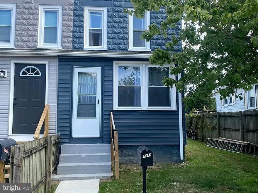 Fresh and clean cozy two- bedroom, one bath end of group duplex townhome in Edgemere featuring warm closed-in sun porch with lots of natural light flowing into the new flooring throughout main level, LR DR and eat in kitchen.  Enjoy the spacious backyard with plenty of room for parking (Schoolhouse Lane entrance).  Lower level has washer/dryer, extra refrigerator and workshop area.  This rental in sought after Sparrows Point area won't last long, apply today!