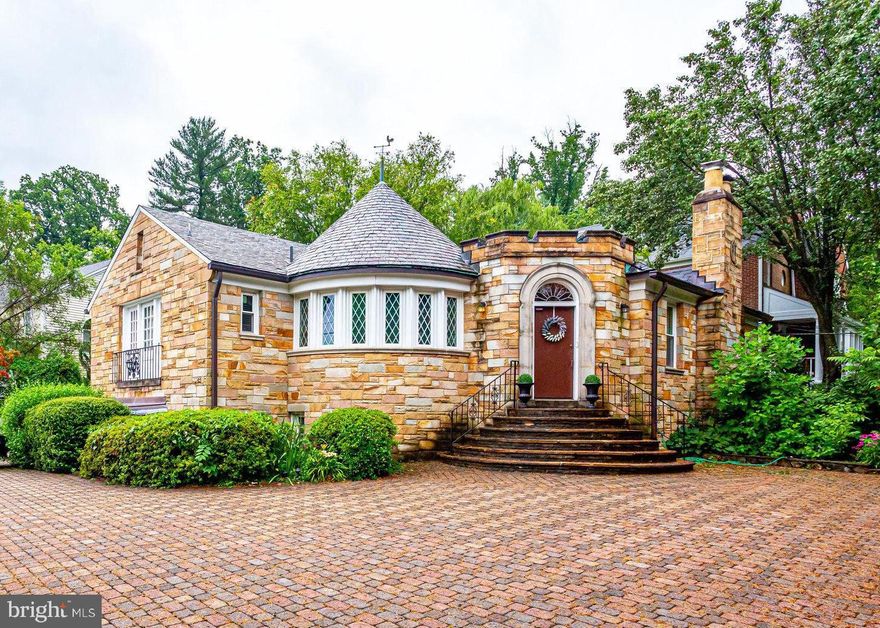 LOCATION, LOCATION, LOCATION! Within walking distance to Bethesda Metro Station, the Bethesda Farmer's Market, and all the shops and restaurants downtown Bethesda has to offer! Welcome home to this magical house where all your dreams can come true! Wish you could have a separate space that was always ready for guests? With the extraordinary entertaining space set aside upstairs, complete with its' own entrance, you could comfortably seat 50 people with room for a dance floor. Or set up a yoga studio with enough mats for 50 people, or let the neighborhood kids use it to ride their bicycles indoors during the winter! The possibilities for this room are endless! And people, that's only ONE room of this entire house! The turret (rounded castle-like feature) is where the front door to your new home welcomes you and your distinguished guests. Downstairs is a completely separate living space with kitchen (has also served as a catering kitchen for fancy functions in the upstairs entertaining space)two bedrooms and two full baths. As if that wasn't enough, outside the lower porch area and connected to the garage, is another living space complete with full bathroom and small kitchenette.  8 years ago, the current owners rented out the lower level to graduate students bringing in a monthly income of over $3500/month. Imagine the income potential NOW.  Before that, the house was owned by a stylist who used the downstairs space for a hair salon while she lived upstairs. Great property for multi family/generational living! Don't miss out on this extraordinary opportunity. You must see it to believe it!