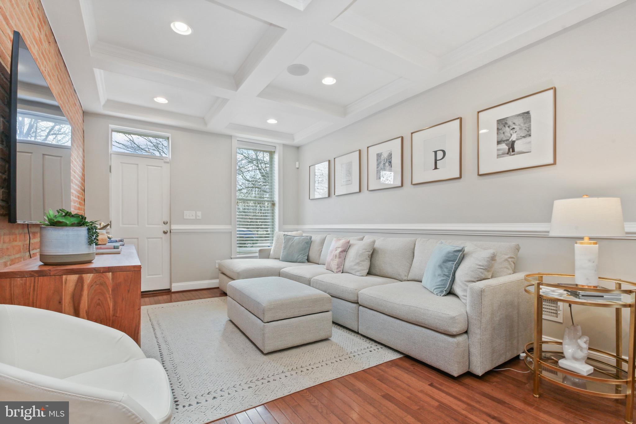 Meticulously maintained 3Bed/3Bath rowhome in Locust Point with more than 2 years remaining on CHAP! Credit saves you $5,700 annually! Step inside 1610 E Fort and be greeted by a symphony of elegance and charm. Gleaming hardwood floors lead the way, complemented by a coffered ceiling and exposed brick walls. The spacious living room boasts enough room for a large sectional, perfect for hosting gatherings. The dining room seamlessly connects to the kitchen, featuring a large island, pantry, granite countertops, stainless steel appliances, custom white cabinets, and room for a large kitchen table. Upstairs, discover a sizable spare bedroom and a luxurious guest bathroom with a large glass-enclosed shower. The primary suite exudes character and comfort, complete with an en-suite bathroom featuring a sizable shower and dual vanity. New California closets add a touch of sophistication to both rooms, installed in 2023. Convenience is key with laundry located upstairs and hallway access to your rooftop. Embrace breathtaking cityscapes, water views, and park vistas from this expansive rooftop deck. A fully finished basement offers additional living space, complete with a bedroom and full bath. Parking is effortless with a generously sized parking pad, while the proximity to Latrobe Park offers ample street parking. This parkfront home sits in the heart of Locust Point, convenient to Fort McHenry, Under Armour Headquarters, shopping, bars, restaurants, and more!