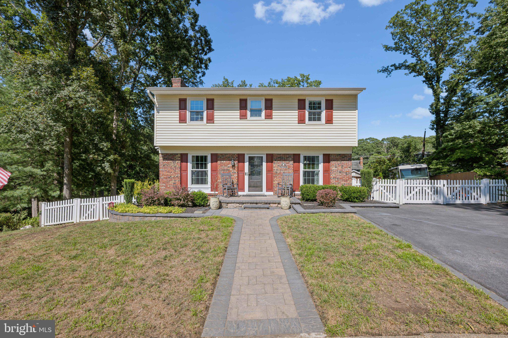 Incredible opportunity to own this stunning home in the award-winning community of Severndale! Welcome to 4 Belhaven Ct, perfectly situated at the bottom of a cul-de-sac, offering both privacy and a wonderful space for neighborhood activities. The expansive backyard has been substantially cleared, providing a large canvas for entertaining, sports or just relaxing on the hammock. Looking for shade? Check out the large covered rear porch!! The beautiful paved driveway leads to an enormous gravel parking pad which is ready to accommodate your RV, camper, boat or work truck. The parking pad offers 50A electric service for your RV or EV, and easy access to the oversized workshop garage – fully insulated, drywalled and climate controlled! Inside the home you'll find a wonderfully maintained residence with modern updates throughout. The kitchen features granite countertops, stainless steel appliances, a custom herringbone backsplash, range hood, pot filler and large peninsula with seating. A stylish half bath is off the kitchen and on your way to the oversized family room with custom built-ins and a gas fireplace. The upper level offers an exclusive primary suite, featuring a custom-tiled shower with body jets, heated bathroom floors and an oversized walk-in closet (closet could be converted back to a 4th bedroom if the new owner wanted). Two additional bedrooms and a full bathroom round out the upper level. Tons of finished space in the basement, along with a half bath, a large utility room for laundry and storage, and direct access to the rear covered porch. Want more outdoor living space? Simply move up to the deck – this house is an entertainer’s dream! Roof, windows, AC and blown-in insulation all upgraded within the last 6 years. New on-demand boiler and water heater installed in 2024. Severndale is consistently rated one of the top communities in Severna Park with its low HOA fee, beach access, kayak storage and frequent neighborhood get togethers, movie nights and food trucks. Schedule your tour today!