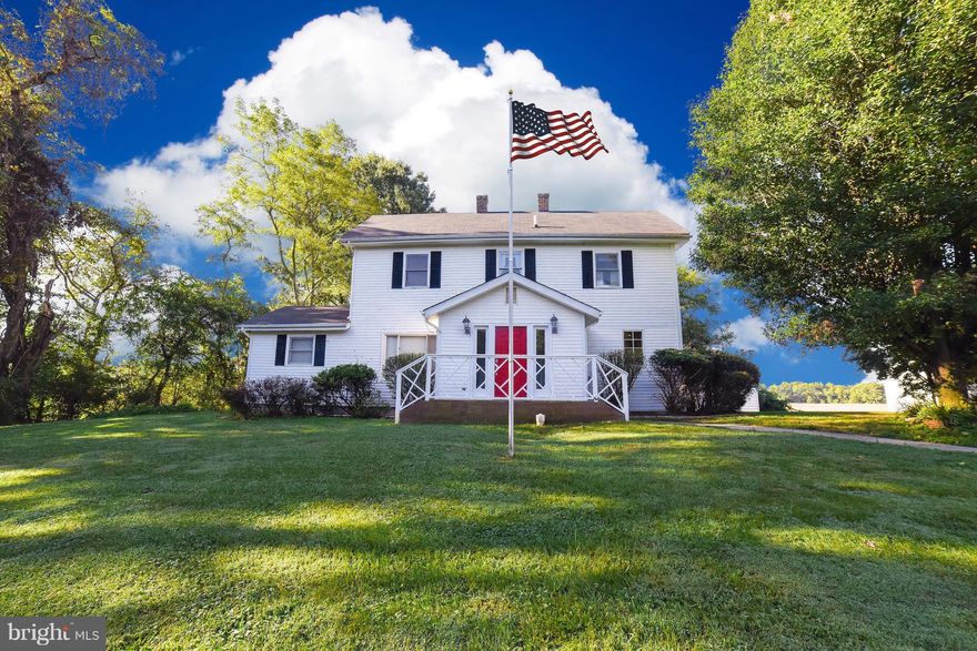 Beautiful equestrian farmette ready to move your horses right in!  Five acres of fenced pastures. Renovated 4 stall barn with power/water.  Fabulous large riding arena with lighting and covered observation deck.  Home has gourmet kitchen with high end appliances.  Main floor master suite. Detached garage and circular driveway provides ample parking for your vehicles and horse trailer.