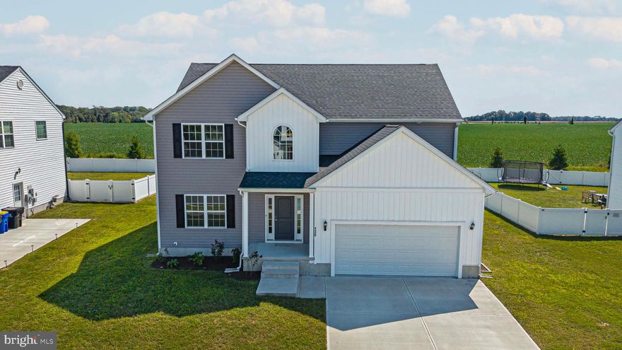 Skip the wait for new construction and move right into this beautifully maintained 4-bedroom, 2.5-bath home in the desirable Barrett Farm community, within the Caesar Rodney School District. Built in 2022 and available only due to a job relocation, this home welcomes you with 9-foot ceilings and an open-concept design that flows seamlessly across the first floor. Gleaming hardwood floors add warmth and elegance, leading into the heart of the home; a bright, modern kitchen with quartz countertops, soft-close cabinetry, and stainless steel appliances. Adjacent to the kitchen, the cozy family room is perfect for gatherings, while the sunroom fills the space with natural light and charm. Upstairs, you’ll find four spacious bedrooms, including a luxurious primary suite with a walk-in closet and a spa-like bath featuring double sinks, a glass-door shower, and a linen closet. A second-floor laundry, a finished basement with versatile living space, and a two-car garage add convenience and functionality. Step outside to enjoy the 12x16 maintenance-free deck, overlooking the backyard and open fields; ideal for peaceful evenings or entertaining with family and friends. Combining comfort, quality, and location, this home is truly an exceptional find.