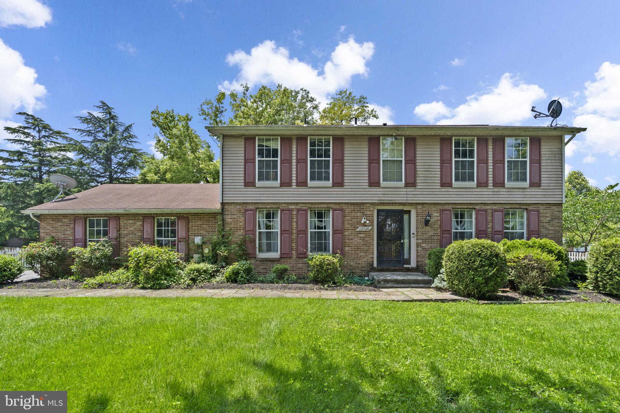 Stunning Colonial in Prime Silver Spring Location! Incredible opportunity to own a beautifully maintained single-family colonial nestled in one of Silver Spring’s most convenient and sought-after neighborhoods! Perfectly positioned just off New Hampshire Avenue, this spacious and sun-drenched home offers easy access to the ICC, I-95, Route 29, and downtown Silver Spring—making commuting a breeze. Set well back from the road on a generously sized lot, this impressive residence boasts over 3,000 square feet of gracious living space, with 4 spacious bedrooms, 3.5 bathrooms, and a versatile walk-up basement. The expansive driveway, ample parking, and attached oversized 2-car garage add both practicality and convenience. Lovingly cared for by the original owners, this home exudes warmth, charm, and endless potential. The heart of the home is the oversized eat-in kitchen, complete with dual refrigerators and plenty of room to cook, entertain, and gather. The massive family room features sliding glass doors leading to a large, flat, and usable backyard. The main level also includes a formal dining room, inviting living room, and a powder room. Upstairs, the primary suite is a true retreat, offering a generous walk-in closet and plenty of room to unwind. Three additional light-filled bedrooms share a full bath.The lower level offers incredible flexibility, with multiple finished rooms ideal for a home office, gym, guest suite, or hobby space. A spacious rec room, ample storage, and a private walk-up entrance add even more value—perfect for a potential rental or in-law suite. Just minutes from White Oak, Four Corners, and a wide variety of dining, shopping, and entertainment options, this home combines comfort, space, and location in one unbeatable package. Don’t miss this rare opportunity—schedule your private showing today and fall in love with everything this wonderful home has to offer!