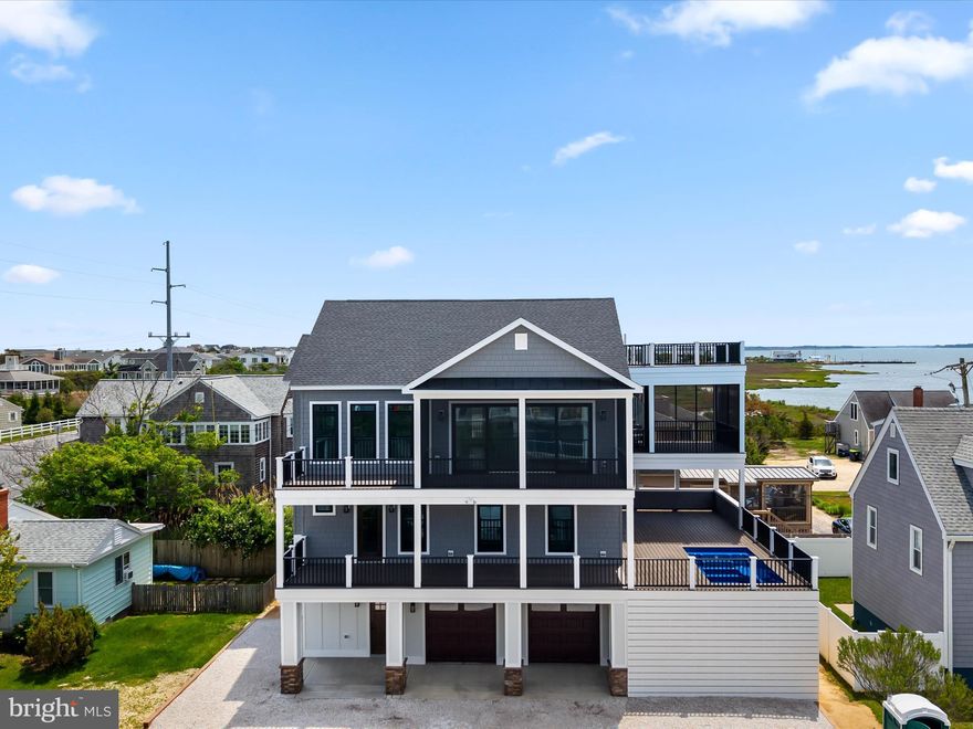 Welcome to your dream coastal sanctuary! This stunning new home, just one block from the gentle waves of Dewey Beach, offers breathtaking bay views and luxurious living at its finest. Boasting an expansive layout with five plush bedrooms and five and a half elegant bathrooms, this residence ensures personal comfort and privacy. Step inside to discover a space where every detail has been meticulously crafted with style and functionality in mind. The large windows flood the living areas with natural light, enhancing the bespoke finishes throughout the home. The primary bedroom serves as a tranquil retreat, complete with spa-like amenities. Entertaining is a breeze, thanks to a state-of-the-art kitchen and a seamless flow to expansive outdoor areas. Here, a sparkling pool awaits to refresh you on warm summer days, while multiple decks offer the perfect spots for evening cocktails as the sun sets over the bay. Call today to embark on a life of luxury and leisure in this exquisite new home, where every day feels like a vacation! Settle in time for the summer season and capitalize on all that beachside living has to offer.