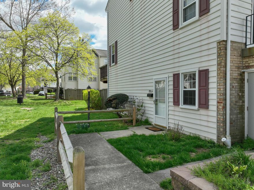 Location is everything! Welcome to Bancroft's one level living in the heart of Crofton. Check out this well-maintained lower-level two-bedroom, one-bathroom end-unit condominium with a front yard area full of open space. Take advantage of this opportunity to own one of the limited lower level end-units where you don't have to contend with lots of steps or parking challenges. Most importantly, say goodbye to staircases and embrace rancher style living as you only have to navigate one step up and one step down, which gets you from your car to your front door.  The kitchen has been updated with stainless steel appliances, and includes plenty of cabinet space with a pantry.  The unit has a newer washer and dryer located in the utility room. Luxury vinyl flooring, ceramic tile, and new carpet flows throughout the home. Enjoy the large living room as it's perfect for entertaining with the option for utilizing the fireplace making the space super cozy. The primary bedroom will comfortably fit your king-size bed and generous closet space will support weekend shopping. The hallway bathroom is strategically located between both bedrooms and functions perfectly for the space. The home was recently refreshed with a fresh coat of paint making this condo ready for you to move-in right away and start enjoying care-free living.  Open space is key, with a playground nearly in your front yard for a quick and advantageous energy release option for children. Walk out to your private fenced-in stone patio allowing for outdoor enjoyment offering a serene retreat.  Relax in the perfect blend of comfort and convenience as residents are just a short one block walk to the Crofton Library with access to nearby parks and multi-use trails. Don't forget about the highly-rated schools in the area and the opportunity for the kids to become a Crofton Cardinals. The location provides easy access to major highways (MD-3, US-50, and I-97), making commuting to D.C., Baltimore, and Annapolis really convenient. The community is just minutes to several shopping centers including the Waugh Chapel Town Center, featuring popular restaurants, shopping, grocery stores, and other entertainment needs.  Upon visiting this wonder home, please see the abondance of parking spaces in close proximity to the unit.  Don't miss out on this opportunity to own in Crofton!
There is monthly Condo fee and annual HOA fee