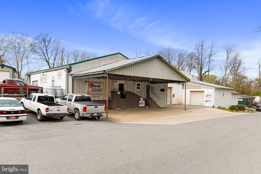 JUST REDUCED and SELLING AS STORAGE BUILDING, etc

Buyer will need to do due diligence for water and septic installation if needed. New reduced price reflects this cost. Seller will not entertain adding.
(Property previously shared a system with additional homes but needs private installed)

This commercial property was recently an automotive shop and can easily be up and running again with septic and water added.  
 Building features 4,500 sq ft of working space, storage, customer lounge area and more. There is an additional separate 2,000 sq ft. building included in sale. The 2nd dwelling does not have water or septic  either.