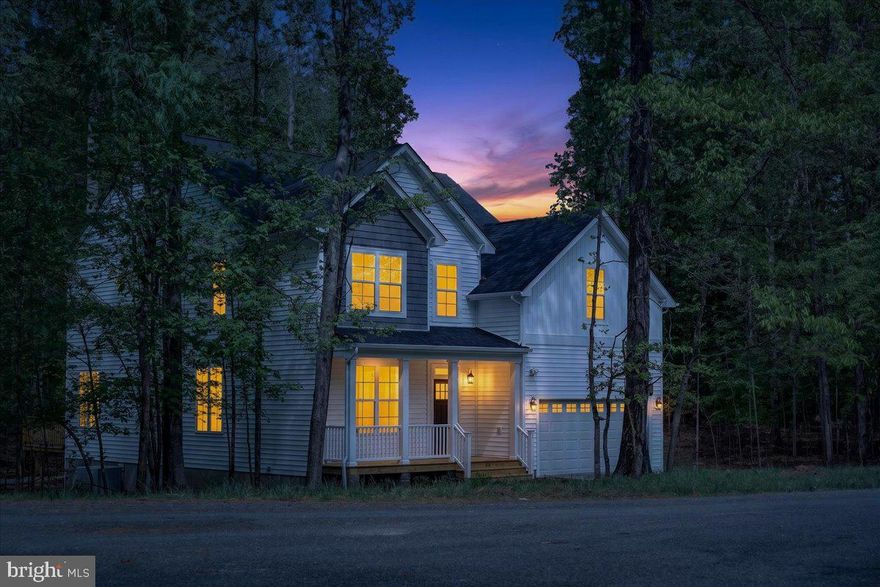 Lake Anna Waterfront Living at an Unbeatable Price
Welcome to a rare Lake Anna waterfront opportunity in the Covenant Coves community on the private side of the lake. This property includes Exclusive waterfront ownership conveyed by a deeded outparcel, located just 0.6 miles (about one minute) from the home. From the property, you’re able to view the waterfront, while also enjoying direct access to the lake, a shared dock, and the option to build your own boathouse—making lake life both affordable and effortless.
Introducing The Madison by Danaf Homes, a brand-new, thoughtfully designed home scheduled for completion in just weeks. Offering 4 bedrooms, 3 bathrooms, an open loft, and over 3,000 square feet of upgraded living space, this home blends modern design with relaxed waterfront living.
Luxury vinyl plank flooring flows throughout the main level and bedrooms, leading to a welcoming family room with a propane fireplace and designer slate surround—perfect after a day on the water. The chef-inspired kitchen features quartz countertops, an oversized island, farmhouse sink, upgraded stainless appliances, and crisp white cabinetry accented with matte black hardware. The dining area opens to the backyard, ideal for entertaining and outdoor gatherings.
The primary suite is a private retreat with a spa-like bath, dual quartz vanity, tiled shower, and soaker tub. A main-level bedroom and full bath offer flexibility for guests or a home office. Upstairs, a spacious loft, two additional bedrooms, and an upgraded full bath complete the layout.
With Waterfront ownership and Lake Anna water views from the property and access to a private community boat launch, this home is perfect as a full-time residence, weekend escape, or investment.
True waterfront ownership with water views—an exceptional Lake Anna opportunity at an unbeatable value.