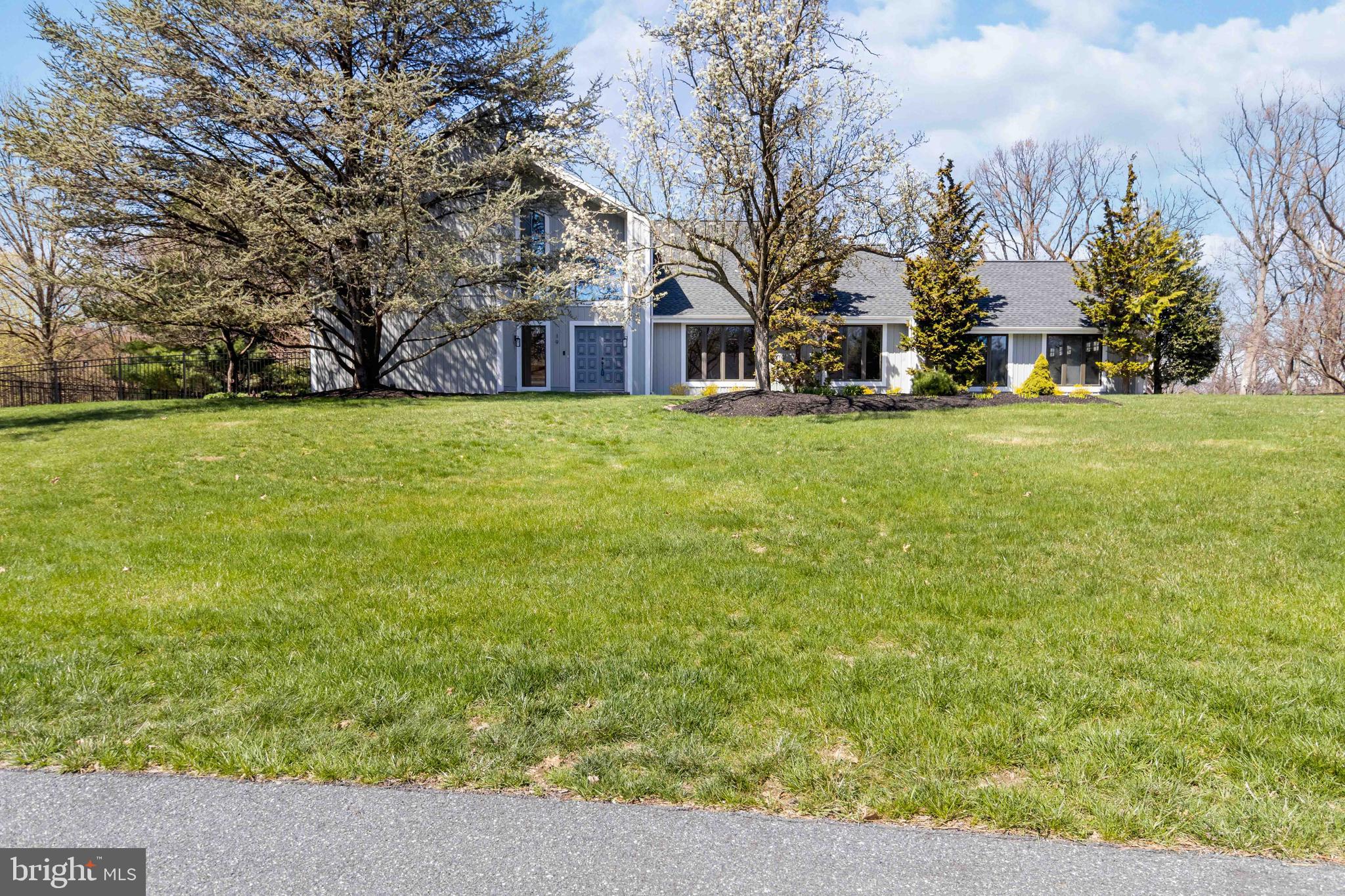 Welcome to this beautifully maintained Heritage Builders home, nestled on 1.7 acres of professionally landscaped grounds. Built in 1988 and thoughtfully updated, this spacious residence offers 4 bedrooms with the 4th being on the main level or can be used as an office, along with 4 full bathrooms — perfect for growing families or multi-generational living. There is the possibility of a 5th bedroom, 5th being in the lower level.
Step inside to find fresh paint and brand-new carpeting throughout. The main level features a first-floor laundry, a formal dining room, and a bright breakfast area. The gourmet kitchen is a chef’s dream with cherry cabinets, granite countertops, and ample prep space.
Enjoy cozy evenings in the sunken family room, complete with a stunning floor-to-ceiling stone gas fireplace. The lower level is fully finished with a full bath — ideal as an in-law suite, guest quarters, or bonus living space.
Relax outdoors on the custom composite deck, take in the tranquil view of the fenced backyard and small pond, or unwind in the screened-in porch. Additional highlights include a spacious primary suite with a large closet, generous storage throughout, and a 2-car garage.
This move-in ready gem blends timeless charm with modern comforts in a serene setting — don’t miss your opportunity to call it home!