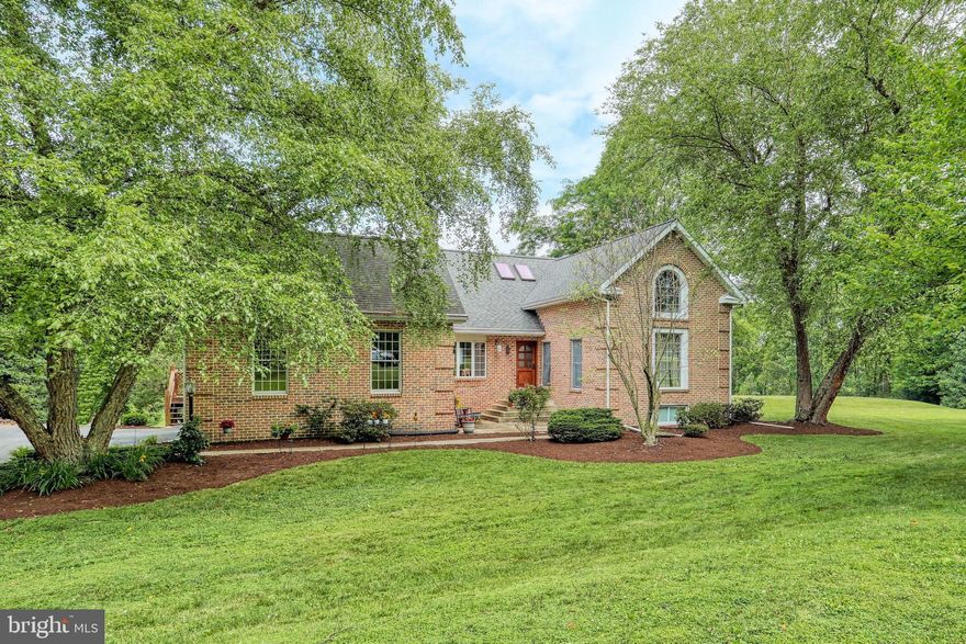 Remarkable Home located on a quiet Cul-De-Sac in Laurel Estates!!!  Offering the ultimate in privacy, this one of a kind home on 5.6 acres offers an Open 2 Story foyer with adjoining half bath, a large 1st floor Office with built-ins. At the other end of the foyer you will be greeted  by a  dramatic Family Room with Cathedral Ceiling Brick Fireplace, and a lot of natural light from all of the windows.  There is also a Formal Din Rm with hardwood floor and crown molding, 1st floor Laundry / Mud Room, and a Large Eat in Kitchen with SS appliances, Island, Ample Counter space, Ceramic Tile Back splash, and a french door to the back deck. This home also features a 1st floor Master Suite with walk in closets, gas log fire place, and built-ins.  The Master bath features a ceramic tile floor, claw foot tub, double pedestal sinks, and shower.   Upstairs you will be greeted by a cat walk / Loft over looking the foyer and family room. 3 spacious bedrooms, and 2 full baths.  Descending to the walk out basement, you will be greeted by a Family Room, Exercise Room, and Utility Room. and Exercise room,     Going out into the back yard, you will find a large, in-ground pool with diving board. There is also gazebo bar area for additional entertaining  space. The yard is surrounded by trees giving you the feeling of being at your own private retreat.  In Laurel Estates you can also enjoy the Riding Trails through the community.   This home has it all!!!  Located on a Culdesac, 5.6 Acres, In ground pool, Privacy, walk out basement, 1st floor master,  4 bedroom, 4.5 bath, Riding Trails and more!!!  Located between York and Lancaster in Laurel Estates. You are going to want to call this  home.
