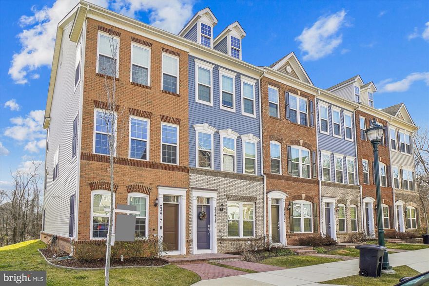Beautiful End Unit in Clarksburg Town Center that backs to  protected forest area.  Opportunity knocks- entry on ground level with office or den and bedroom with full bath.  Main level has beautiful kitchen, dining and living area. Upper level has two bedrooms, two full baths and laundry area.  Wired Smart home. Two parking spaces - #72. 
Community Amenities: Tot Lot, Clubhouse, Outdoor Pool, Pond, Ampitheater with summer concerts too much to mention.  Clarksburg Outlets close by along with I-270.