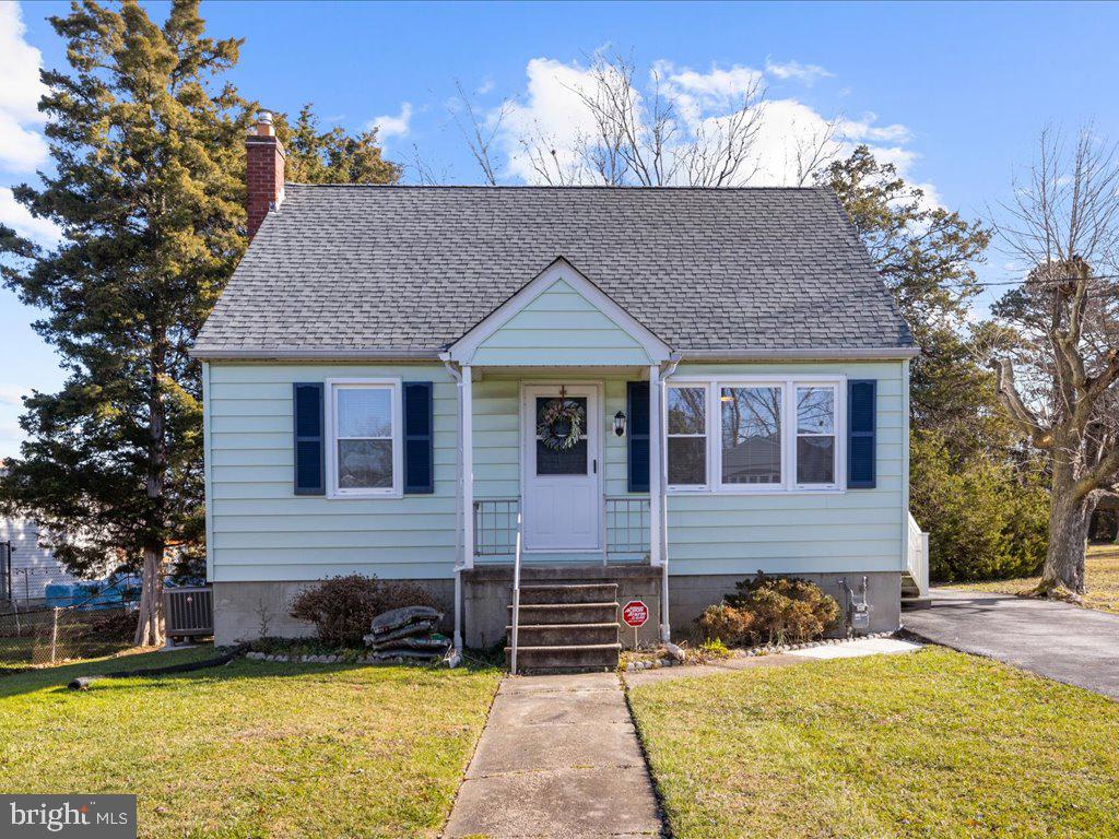 Step into this beautifully renovated Cape Cod, where spaciousness meets charm. With three finished levels and over 1,800 square feet on a .3-acre lot, this home offers an abundance of flexible space to suit your needs. The main level welcomes you with a bright, inviting living room featuring warm hardwood floors. The fully remodeled, eat-in kitchen boasts white shaker-style cabinets, quartz countertops, a subway tile backsplash, stainless steel appliances, and luxury vinyl flooring. Two of the four bedrooms are conveniently located on the main level, each offering additional versatility as a dining room, home office, or more. A full bathroom with vintage tile and updated fixtures completes this level. Upstairs, the primary bedroom is a true retreat, complete with an ensuite bathroom and a walk-in closet. The primary bathroom features a soothing tiled tub/shower with a lighted niche. The finished lower level offers a large family/recreation room, an additional bedroom, and a half bath, accessible by both interior staircase and a door to the side/rear yard. A spacious unfinished utility/laundry room provides ample storage. Outside, the large backyard is an entertainer's dream, featuring a fire pit, a shed, and plenty of space for outdoor living, play, and even recreational vehicle storage. Additional renovations include refinished hardwood floors, new luxury vinyl flooring, updated light fixtures, bath and plumbing fixtures, and fresh paint throughout. Situated on a cul de sac and conveniently located near Belair Road and major commuting routes, this home truly has it all. Welcome home!