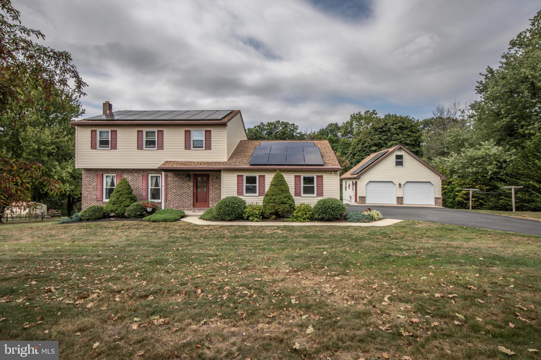***SHOWINGS START AT THE OPEN HOUSES ON SATURDAY 9/27 & SUNDAY 9/28 FROM 11AM -1PM ***Welcome to this charming 3-bedroom, 2.5-bath Colonial located in the desirable Boyertown area. Nestled on nearly an acre of land, this property offers the perfect blend of comfort, function, and efficiency. Inside, you’ll find gleaming wood floors throughout the main level, a beautifully updated kitchen and bathrooms, and a smartly designed floor plan for easy everyday living. The finished basement adds versatile living space, ideal for a family room, home office, or play area. Enjoy outdoor living on the oversized deck with a covered roof, perfect for entertaining or relaxing in any season. The home also includes a detached 2-car garage, outdoor storage shed, and plenty of yard space for gardening, play, or gatherings. For added value, this property comes equipped with leased solar panels, providing efficient and environmentally friendly living. A first-floor laundry room adds everyday convenience, while the spacious yard and outdoor amenities make this home a perfect place to relax, entertain, and call your own.