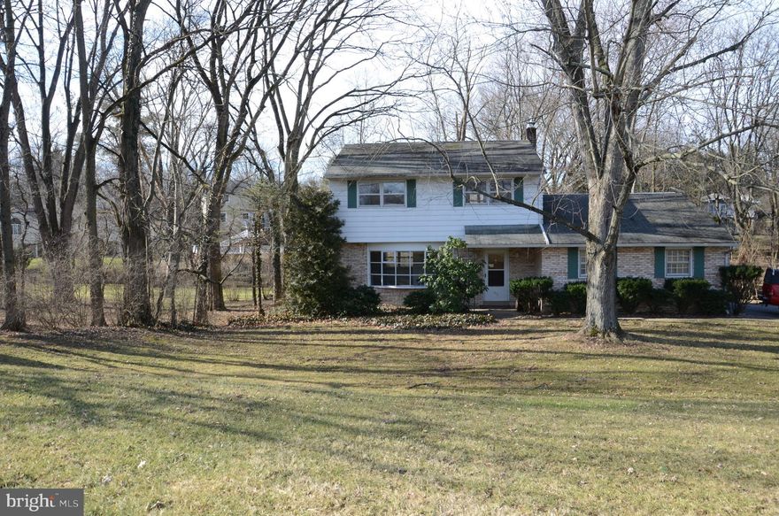 Location Location Location!  Now's your chance to own a corner lot with a view of the West Shore Country Club Golf Course.  Back yard features a small stream.  Partially wooded with beautiful mature trees.  Built in 1965, this 3 bedroom, 2 1/2 bath home is being sold "as is".  Hardwood floors on first and 2nd level. Slate entryway.   New furnace.   Owner occupant buyer could move in while completing renovations/updates.   Investors welcome.  Over sized lot may have subdivision potential.