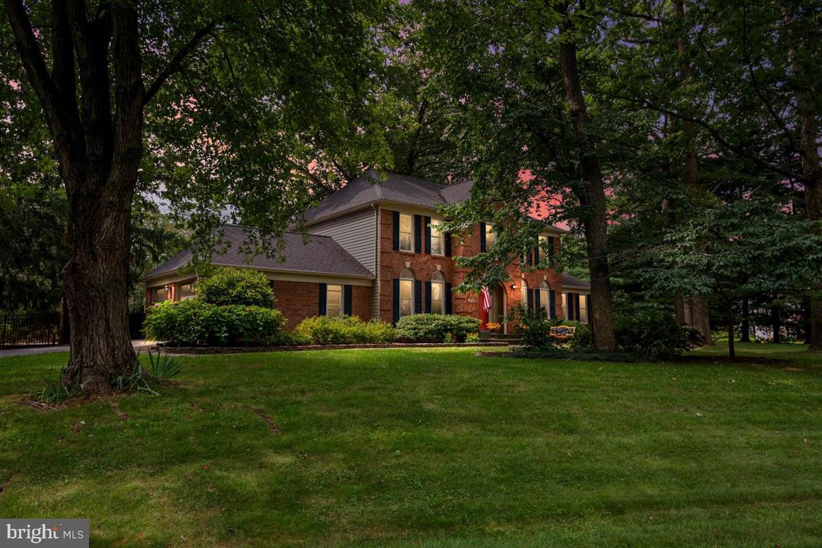 DEADLINE FOR OFFERS EXTENDED TO WEDNESDAY, 5:00PM.. Stately Georgian with Contemporary Flair! The Sellers have lovingly renovated every element of this home and the result is impressive! Although it has the balance and symmetry that marks the Georgian style, there are some surprises. On the approach, the brick front, hips roofs, manicured landscaping, flagstone walkways and elongated windows denote the substance and stability of the structure. The porcelain-tiled foyer and staircase are centrally located; living and dining room are proportional and balanced to the right and left. But this is NOT your stuffy Georgian. The blond hardwood inlaid floors, soft white porcelain tile, subtle paint colors and window treatments warm up the rooms and invite you to spend some time here. The home office is located off the living room in a corner where sound does not intrude. The Surprise - the Open Great Room facing the rear yard! The eat-in kitchen boasts solid natural cherry soft close cabinets (dovetailed joinery), solid end panels and under-cabinet lighting; Kitchen Aid Stainless Steel Appliances including the French door refrigerator and double oven; marble backsplash, granite counters and peninsula with pendant lights. The triple pantry closet is inconspicuous and a separate laundry, which houses the Whirlpool Duet High-Efficiency Front Loader Washer/Dryer, is tucked away to the side. The renovated Bay Window Box in the eating area and 3-paneled window/sliding door in the great room offer pleasant views of the greenery, flowers, pool & patio - your private oasis. The family area with its arched, wood-burning fireplace leads out to the deck by way of the 3-paneled sliding door and the message is clear: this hub is for relaxing and entertaining! The sellers have hosted huge annual summer get togethers for their large families and many friends for 20 years. The meandering flagstone walkways and patio, stone walls and borders that protect luscious flowers and shrubs, and the pebble stone pool deck complete with attached spa and lighting, easily host a large crowd without feeling confined. The 2-car, side-loader garage (cabinets and attic space), extra parking pad and driveway provide storage and parking. The 5-foot Jarith fence which encloses the pool and patio area has black mesh to keep the cats contained. (Yes, it works and the sellers can remove if desired.) The red oak hardwood floors continue to the upper level which is home to four bedrooms and 2 baths. The Master Bedroom has the walk-in closet and private en suite bath renovated to include a vintage claw-foot tub, double vanity with granite countertop, separate travertine tiled shower and floor. The basement renovation includes the waterproof, vinyl wide-plank flooring, recessed lights and a makeover of the full bath. The choices are yours: use as an additional sitting room, studio, home gym or bedroom. (It has a closet and new exterior door). The unfinished side is used for storage and the water treatment system with reverse osmosis. Review the Features List for all renovations and updates as there are too many to list! The sellers are sad to go but are ready for the next chapter! This home could be yours! View photos and 3D tour including those of flowers, greenery and basement storage. Floor plans and features list are uploaded with the disclosures. SHOWINGS START with the Open House on Sunday, September 20th from 1:00 until 3:00pm. See you there! Tax and square footage to be verified by buyer.