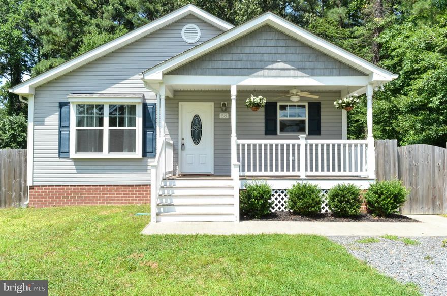 Better than new all the upgrades are here. Side vinyl rail deck, stainless steel appliances, vaulted living room ceiling, and a nice  storage shed and a fenced in back yard with large gate for easy access. This home has an open floor plan with 3 bedrooms and 2 baths, and low county taxes only. One year home warranty.Ready to move in for a fast sell.