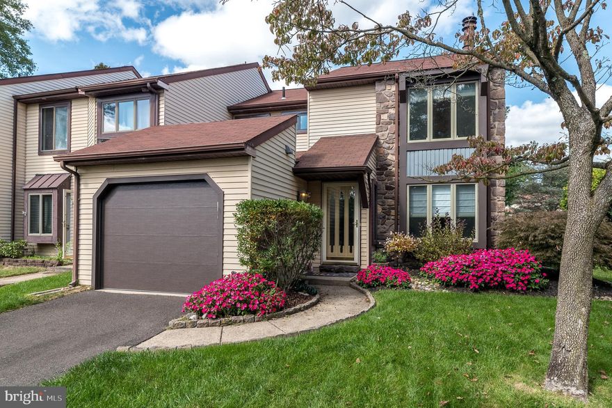 Welcome to 361 Milford Ct., a beautiful and meticulously maintained 3 bedroom, 2.5 bath end-unit townhome in the Raintree development in Newtown Township. Upon stepping into the entryway, the cheery, light filled living room opens in front of you and boasts a large bay window and wood-burning fireplace for those chilly nights that lie ahead. Upgraded flooring flows from the living room into the spacious dining room that also has a large bay window that lets in vast amounts of natural light. The living room also connects to the updated kitchen that opens into the back family room that also features the upgraded flooring and space that is both cozy for some alone time, but also allows for entertaining friends and family. There is also a laundry area and half bath off of the kitchen, and entry into the attached garage. The family room boasts sliders that open to a lovely back patio and fenced-in backyard. One the second level of this home, there is a large primary bedroom with an updated en-suite bathroom, plenty of closets and a vaulted ceiling. Two additional, nice sized bedrooms and an updated hall bath complete this level. Back outside, there is space for parking in the driveway, along with additional parking in the adjoining parking lot. This community has much to offer, along with being conveniently located to shopping, restaurants and all modes of transportation into Philadelphia, New York and beyond. Come see all that this wonderful home has to offer and make it your own!