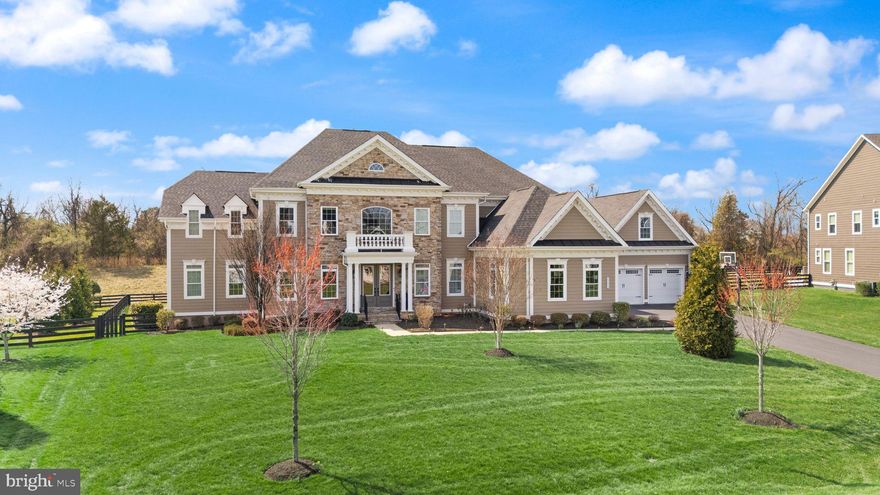 Welcome to the jaw-dropping Clifton Park II, perfectly positioned in the prestigious Willowsford – The Greens, where timeless elegance meets modern luxury, with every detail thoughtfully curated to captivate even the most discerning buyer.

From the very first moment, this residence makes a powerful impression. A grand 4-car garage equipped with 2 EV chargers sets the tone for elevated living, while the thoughtfully designed Friendship door entry creates a seamless flow between the garage, mudroom, second private office, and the heart of the home—offering both convenience and sophistication rarely found.

Step inside, and you are immediately embraced by a sense of arrival. A majestic, magazine-worthy staircase rises gracefully, setting the stage for what unfolds within. To the left, an elegant sitting area invites meaningful conversations and refined gatherings, while to the right, a formal dining room awaits unforgettable dinners and celebrations. Just beyond, a beautifully appointed wine bar perfectly bridges the dining space and kitchen—designed for effortless entertaining.

At the heart of the home lies a recently updated chef’s kitchen, a true statement of style and function. Featuring two oversized islands, top-of-the-line appliances, two sinks, two dishwashers, and a custom hood,  this space is both breathtaking and brilliantly designed. It flows seamlessly into the dramatic two-story family room, where walls of windows flood the space with natural light and offer a stunning gallery view from above.

The main level continues to impress with two private offices, ideal for today’s lifestyle, along with a guest suite with a full bath, an additional powder room, and a well-appointed laundry room. From here, step outside to an extraordinary outdoor retreat.

The backyard is a true sanctuary, crafted for both grand entertaining and peaceful everyday living. A Flagship stone patio, built-in grill, and outdoor kitchen anchor the space, while a pergola-covered dining area creates the perfect setting for al fresco evenings. Surrounded by a lush, fenced lawn and open views, this outdoor experience feels both private and expansive.

Upstairs, luxury continues with five exceptionally spacious bedrooms, each offering its own private ensuite bath and walk-in closet, ensuring comfort and privacy for every member of the household. The primary suite is a retreat of its own—generously sized, featuring an enormous walk-in closet and a spa-inspired bath complete with a jetted tub, oversized shower, and dual vanities designed for indulgence.

The fully finished lower level elevates the home into a complete lifestyle experience. Designed for entertainment and relaxation, it features a full wet bar, a dedicated media room, a bonus room, a play area, and an additional bedroom with a full bath. A walk-up staircase provides seamless access to the backyard, enhancing both function and flow.

Perfectly facing northeast, this home aligns beautifully with principles of light, energy, and harmony—an element deeply appreciated by those seeking not just a home, but a space that feels right in every sense.

This is more than a residence—it is a statement. A home where luxury, comfort, and thoughtful design converge to create an extraordinary living experience in one of the region’s most sought-after communities.

Willowsford Amenities
🏞️ Outdoor & Nature
40+ miles of trails across all villages (Greens, Grove, Grant, Grange)
Lakes & ponds (Willow Lake, Pin Oak Pond)
Kayaking & canoeing on Willow Lake
Scenic farmland, meadows & preserved open space
Campground (Grant Family Campground)
🏡 Clubhouses & Gathering Spaces
The Lodge at Willow Lake
Sycamore House (signature event venue)
Bear Barn Tree House
White Oak Tree House
Log Cabin Tree House
Pavilions & reservable event spaces
🏊 Pools & Water Features
Resort-style pools (Sycamore Pool, Lodge Pool)
Splash parks / Spray-n-Play areas
Willow Lake recreation area 
And Much MORE!!!