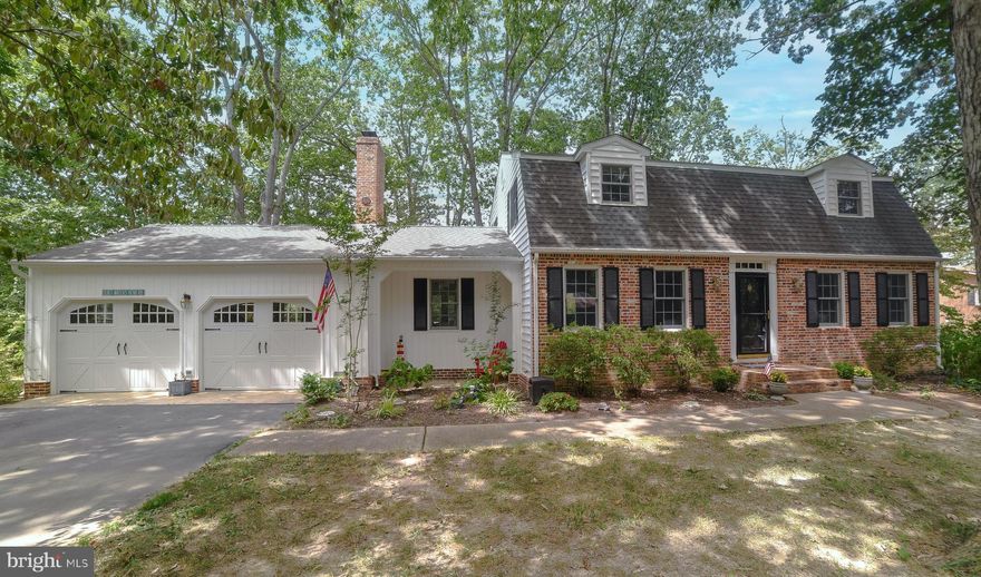 If you enjoy boating, crabbing and/or fishing, don't miss this home on a nice protected area of Cuckold Creek- leading out to the Patuxent River.    Sitting on almost an acre of land, with over 100' of waterfront with private pier (with electric and water hookup) this  lovely home is well maintained and shows pride of ownership with several updates throughout.   The beautiful  kitchen is sure to please any cook, with a large island,  granite countertops, stainless appliances, gas cooktop and lots of cabinet space.   With tons of natural light, this home features a formal living room, dining room family room off of the kitchen with a wood stove insert in the brick fireplace.  The main level also boasts a beautiful sunroom and hardwood flooring throughout.   Access the large composite back deck from the family room or the sunroom.      Upstairs there are 3 spacious bedrooms and 2 full baths.   Large two car attached garage, pole barn (with electric) and two sheds for more outdoor storage.  There is still plenty of warm days ahead to enjoy this waterfront retreat in Hollywood MD.