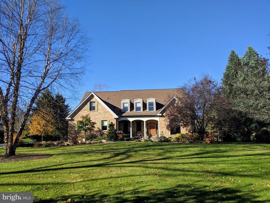 This incredibly built home sits on a beautifully landscaped 1.26 acre lot on a cul-de-sac, just 5 minutes to downtown and campus! The graceful open floor plan is flooded with natural light and features vaulted ceilings, a sunken living room with impressive double-sided fireplace, a spacious kitchen with bright white cabinets and new tile backsplash, hearth area, and table space that opens to the massive deck and fenced in yard. A grand first floor owner's suite, stunning piano room, and inviting dining room complete the elegant first floor layout. Upstairs you'll find 3 spacious bedrooms with fantastic views, two additional baths and large bonus room to be used as playroom, office or 5th bedroom! Living space continues to partially finished walk-out lower level with media room and laundry room - plus endless storage space.