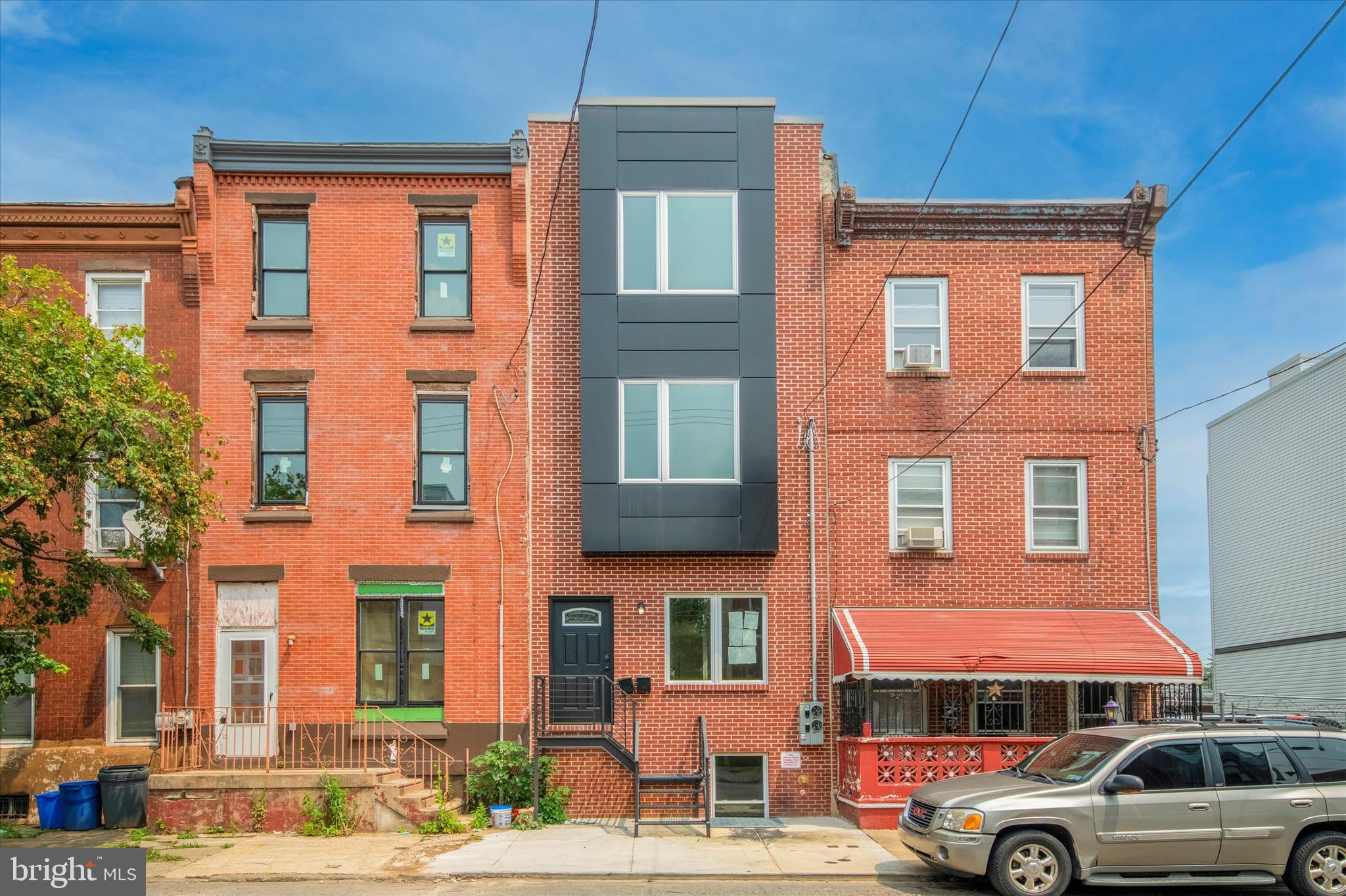 UPPER UNIT WAS RENTED AT $1850. Welcome to 2137 N 5th St  a beautifully built top-notch duplex located in Norris Square , one of the hottest sections of Philadelphia on active 5th Corridor. This stunningly finished multI family TWO UNITS apartment in highly desirable investment opportunity surrounded by new construction and numerous rehabbed properties. The meticulous and respected builder spared no expense in finishing this property to ensure maximum rental income. The unit combination includes a bi-level unit #1 with 3 bedrooms, 1,5 custom bathrooms, a large living room, and a huge backyard. Bi-level unit #2 was rented at $1850 which  offers 3 bedrooms and 1,5 custom bathrooms . The expected monthly rental income for both units is over $3400+. All units feature high-quality flooring, white shaker cabinets, state-of-the-art stainless steel appliances, custom tile bathrooms, and more. This property qualifies for 10 years tax abatement, and it's located in a highly desirable Norris Square  neighborhood, making it an exceptional investment opportunity. The agent has financial interest ! Don't wait! Schedule a showing and make your move today!