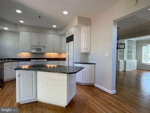 Photo of 9715 Whitley Park Place #TH-11, BETHESDA, MD 20814 (MLS # MDMC2211084)